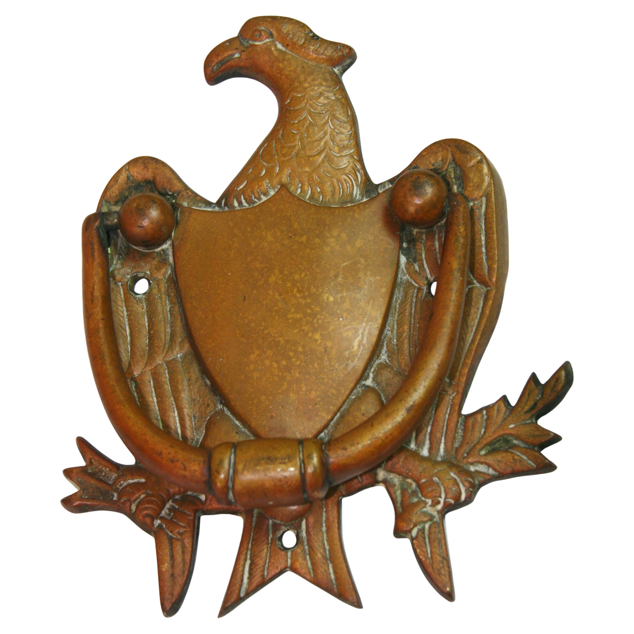 Battente per porta con aquila americana in ottone antico