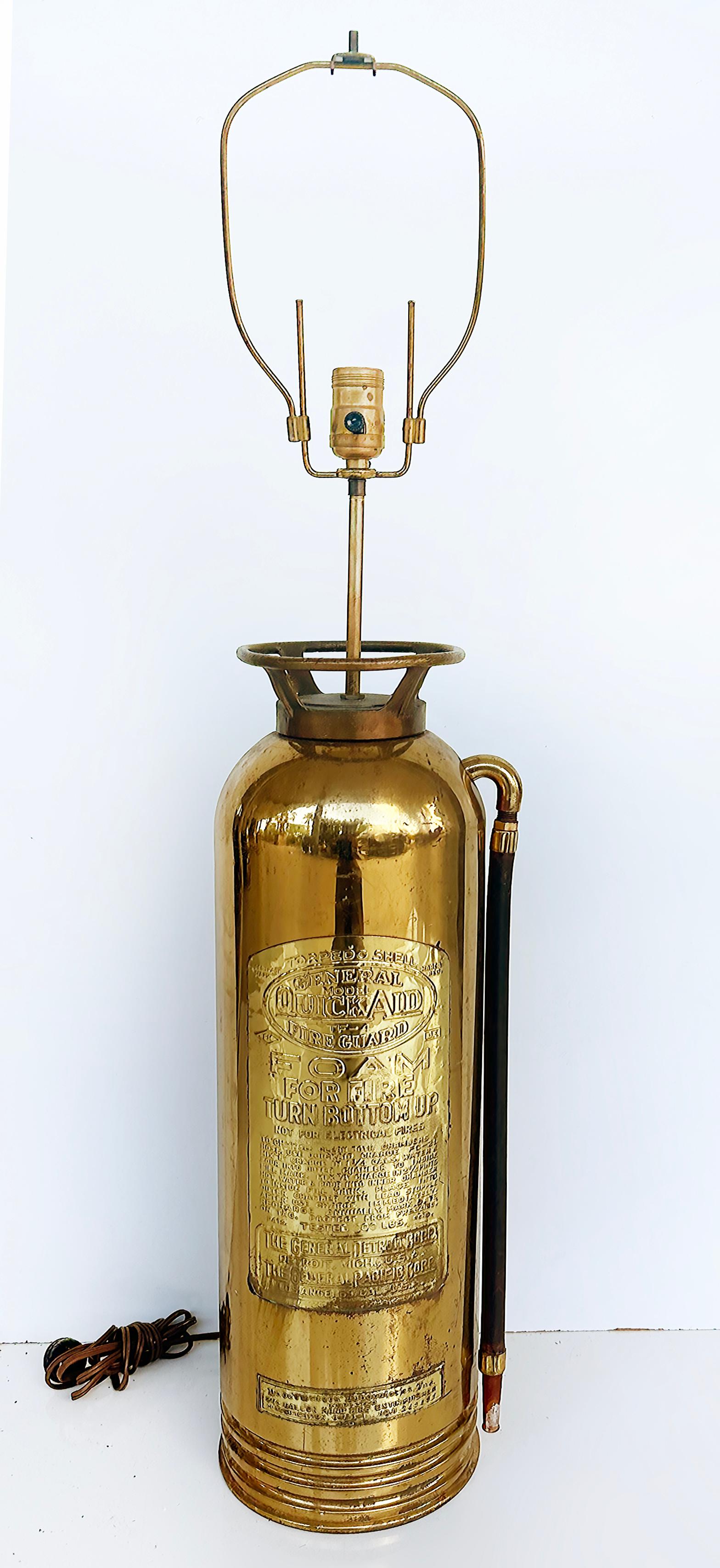 Antique Brass and Copper Fire Extinguisher Table Lamp



Offered for sale is an antique polished brass and copper fire extinguisher that was converted into a table lamp during the mid-20th century.  The extinguisher has a large decorative Torpedo's