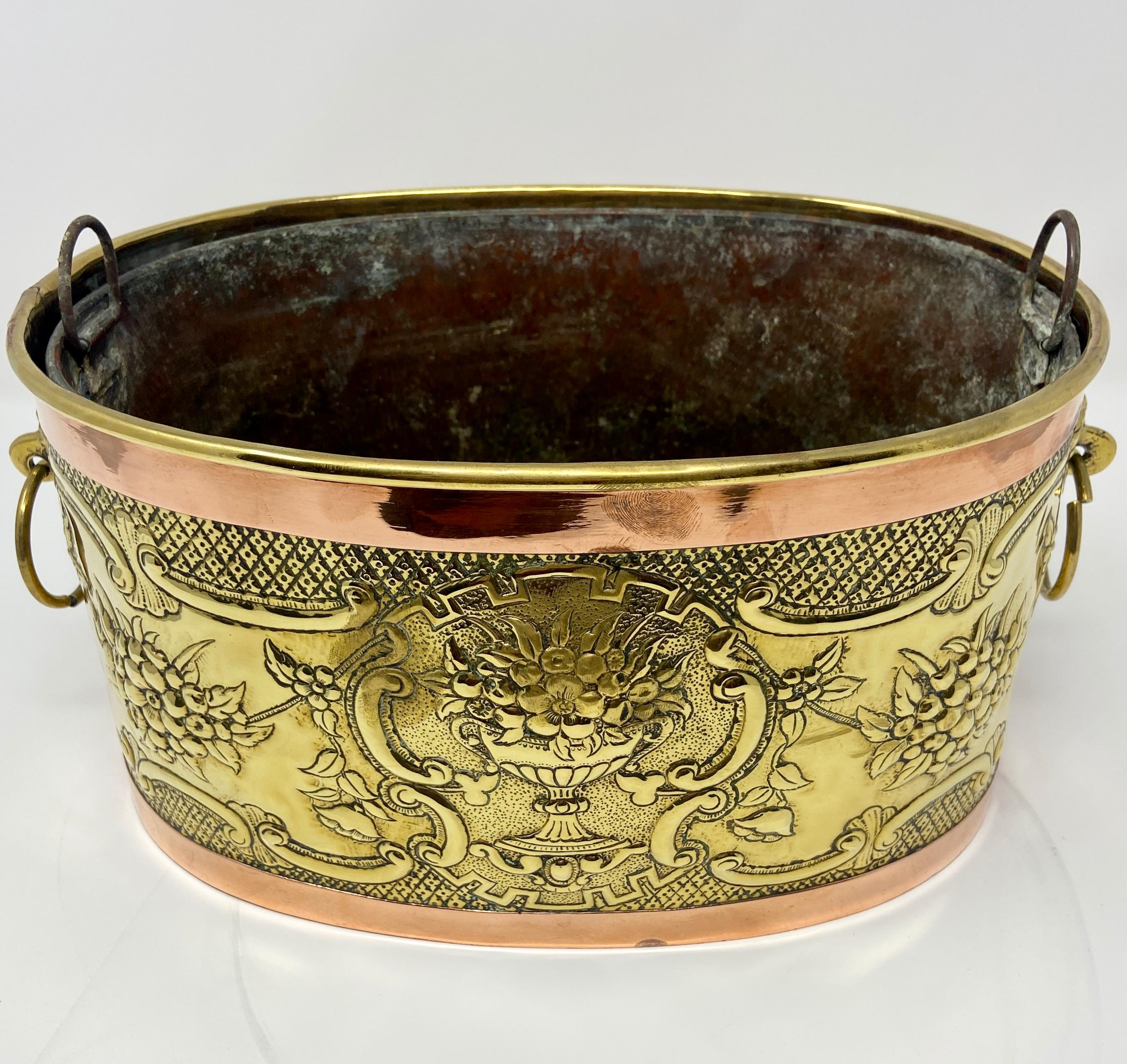 Antique brass and copper oval planter with liner circa 1890-1900.