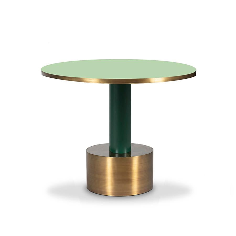Crafted in brass with your choice of lacquered wood, Rio is tropical and sexy. This dining table seems to move with a casual samba swing. Get yours and live the endless carnival.

Made of antique brass and lacquered wood.