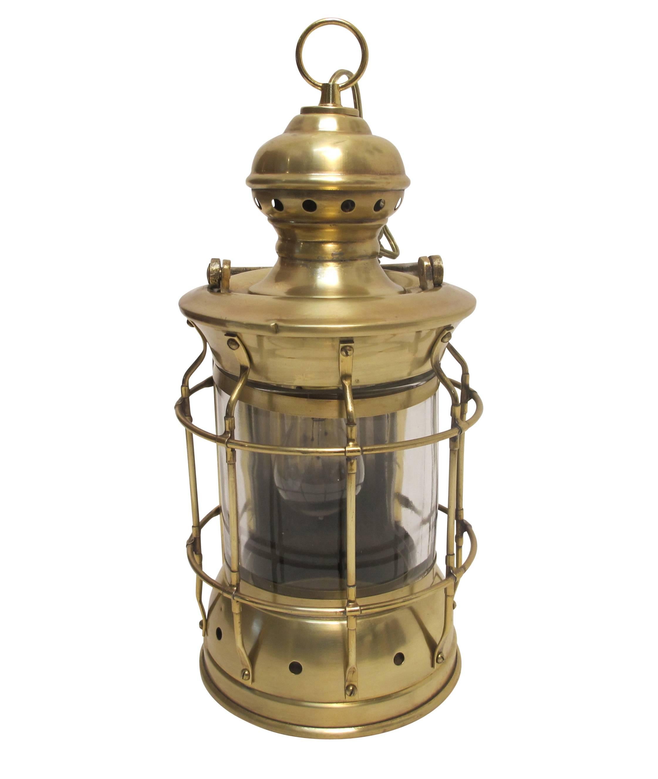 Ships brass lantern or lamp with clear glass shade.  Possibly English, 19th. Century.   Newly wired with a single standard size socket.  