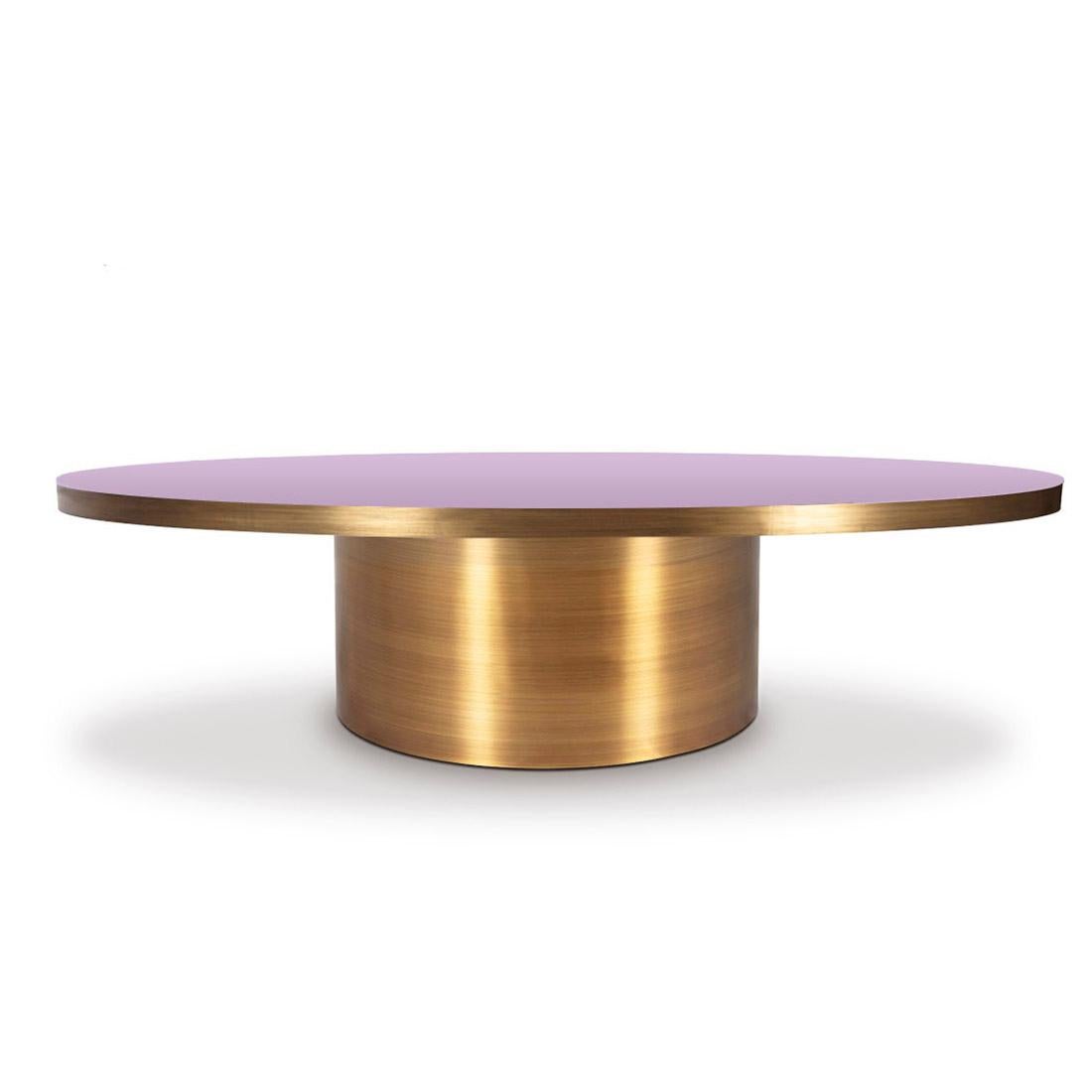 Rio center table is a truly unique piece of furniture that exudes tropical, sexy style. Crafted from the highest quality brass and your choice of lacquered wood, this dining table is built to last. The combination of the brass base and the lacquered