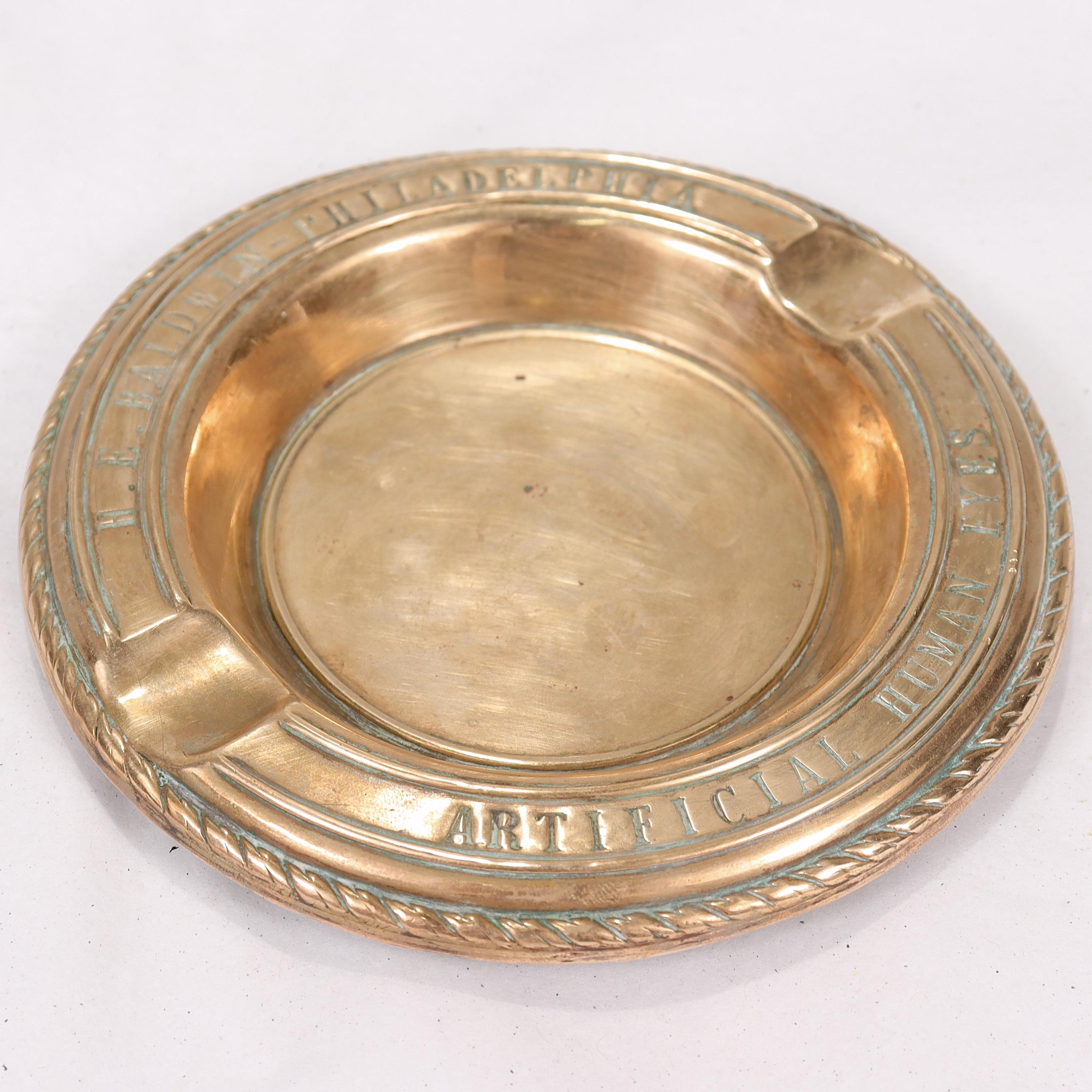 Antique Brass Ashtray Advertising a Philadelphia Dealer in Artificial Human Eyes For Sale 1