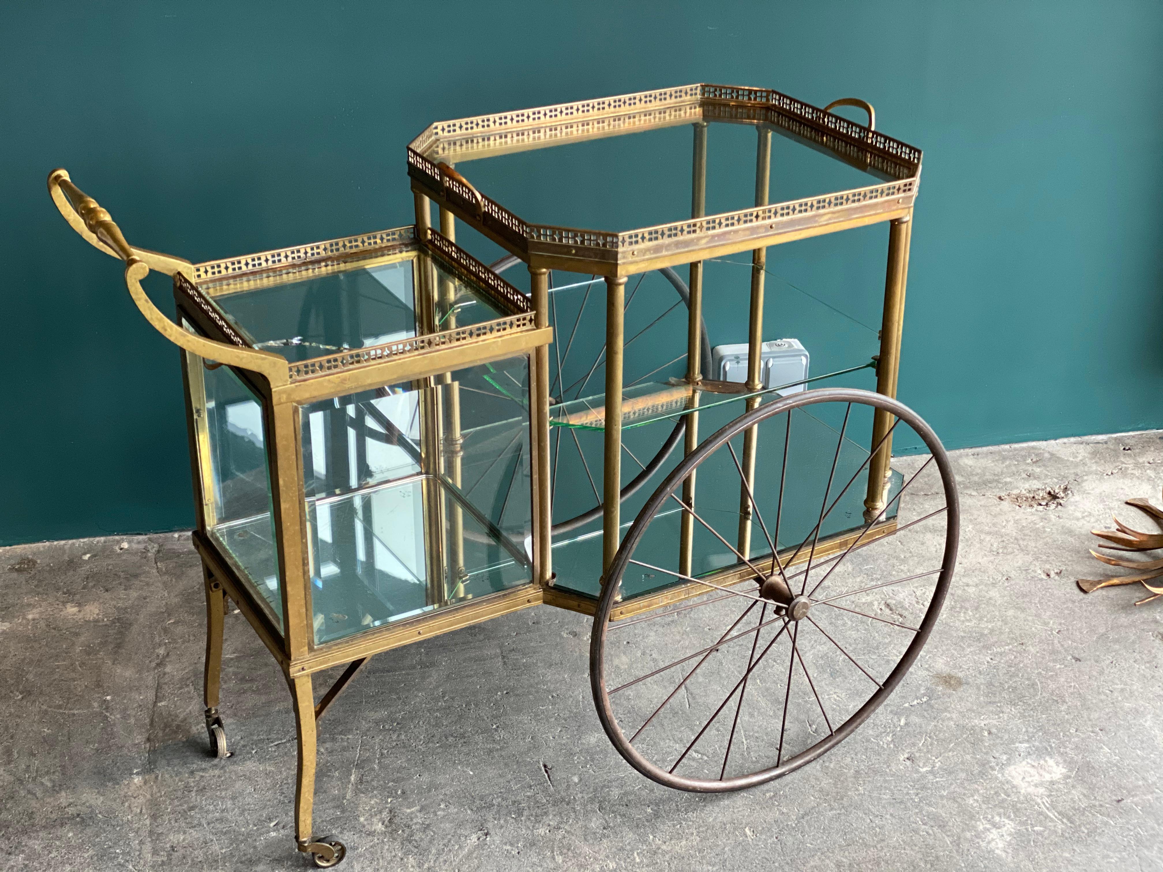 This very unusual bar carriage is from the end of the 19th century and comes from a castle. The smart and special thing about this tea trolley is not only its appearance but also its multifunctionality. The upper part of the trolley can easily be