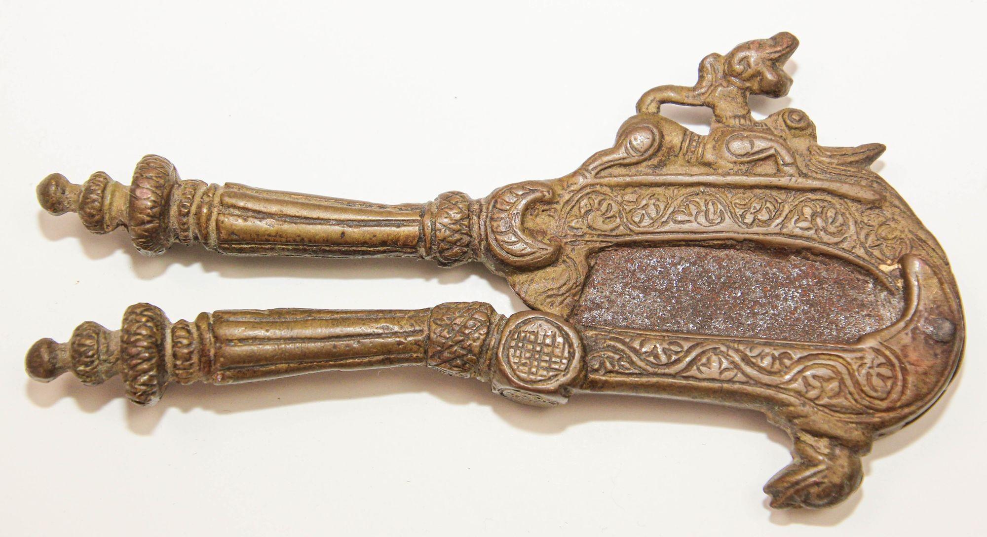 Antique Brass Betel Nut Cutter from India Collectible Asian Artifact
This excellent piece of art from India, made in solid brass, nut slicer or nut cracker which is two halves made with cast detailed design, It is connected with a copper rivet this