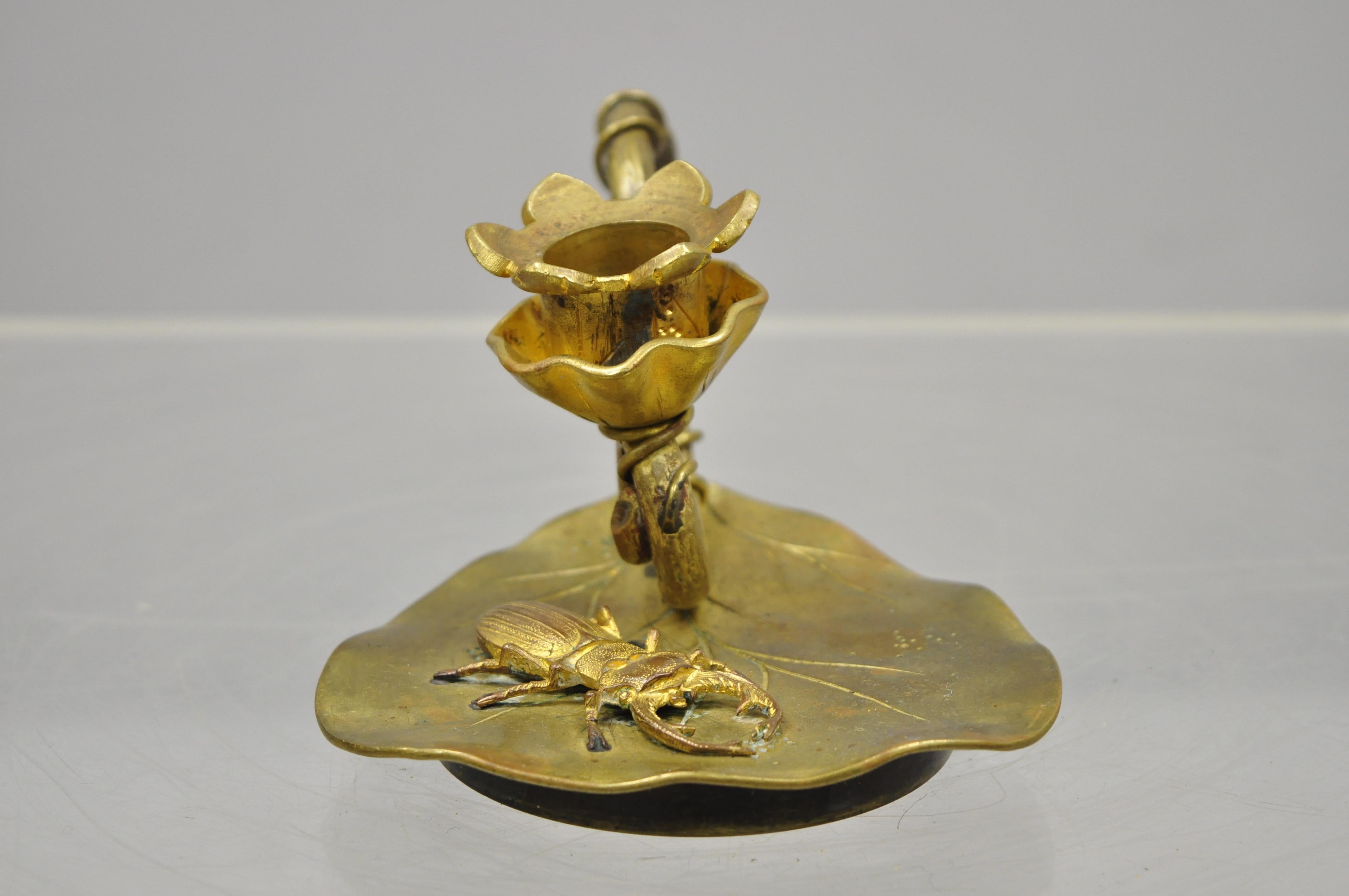 Antique brass bronze stag beetle on lily pad candlestick candleholder, circa early 1900s. Measurements: 3.5
