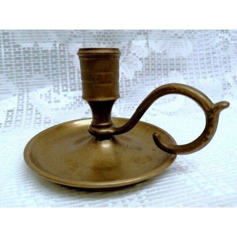 antique candle holder with finger loop