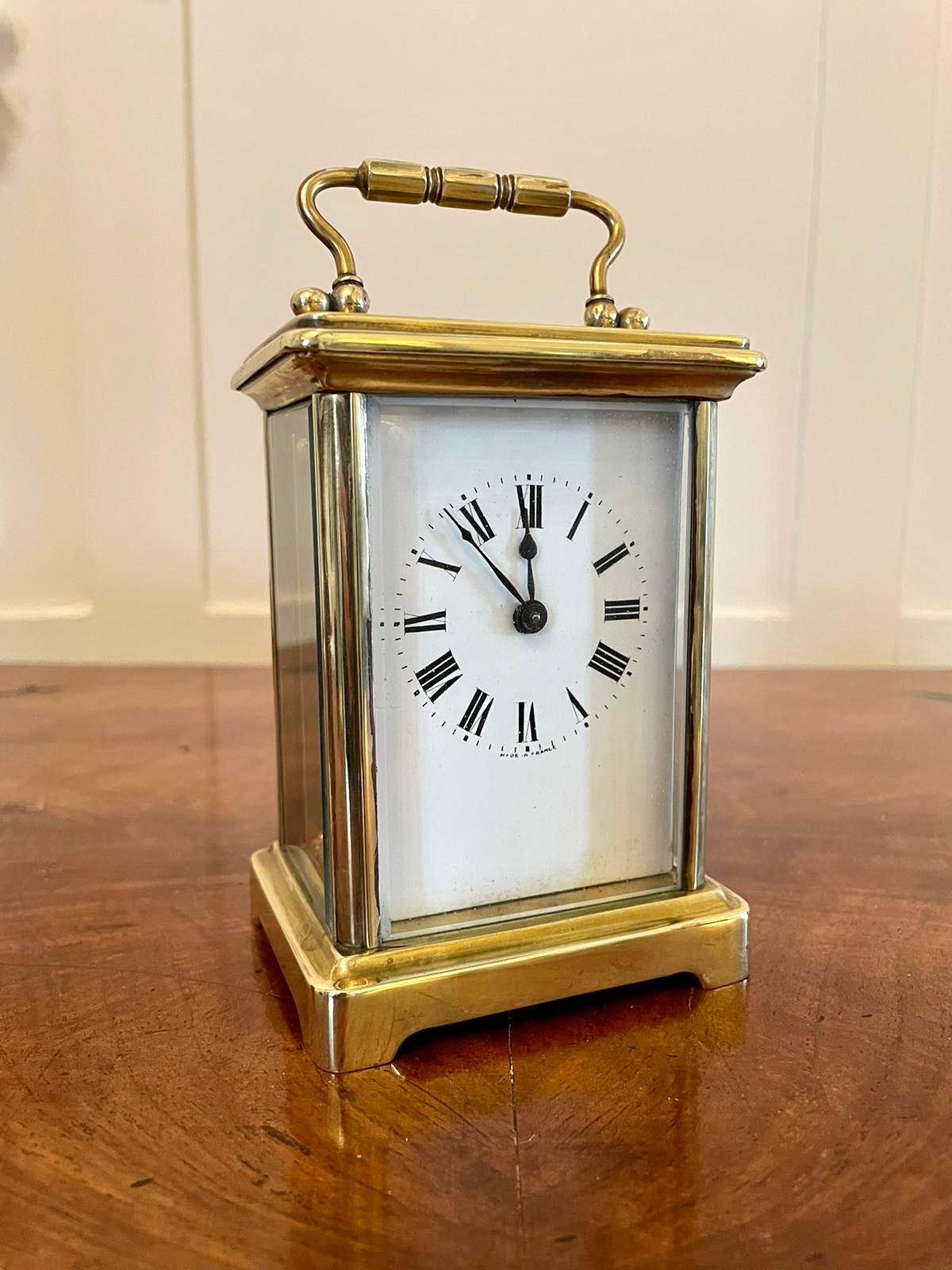 Antique brass carriage clock having a quality brass case, eight day French movement, enamelled dial with elegant original hands and bevel edged glass. It is in good working order and comes in its own original travelling case with original key.

A