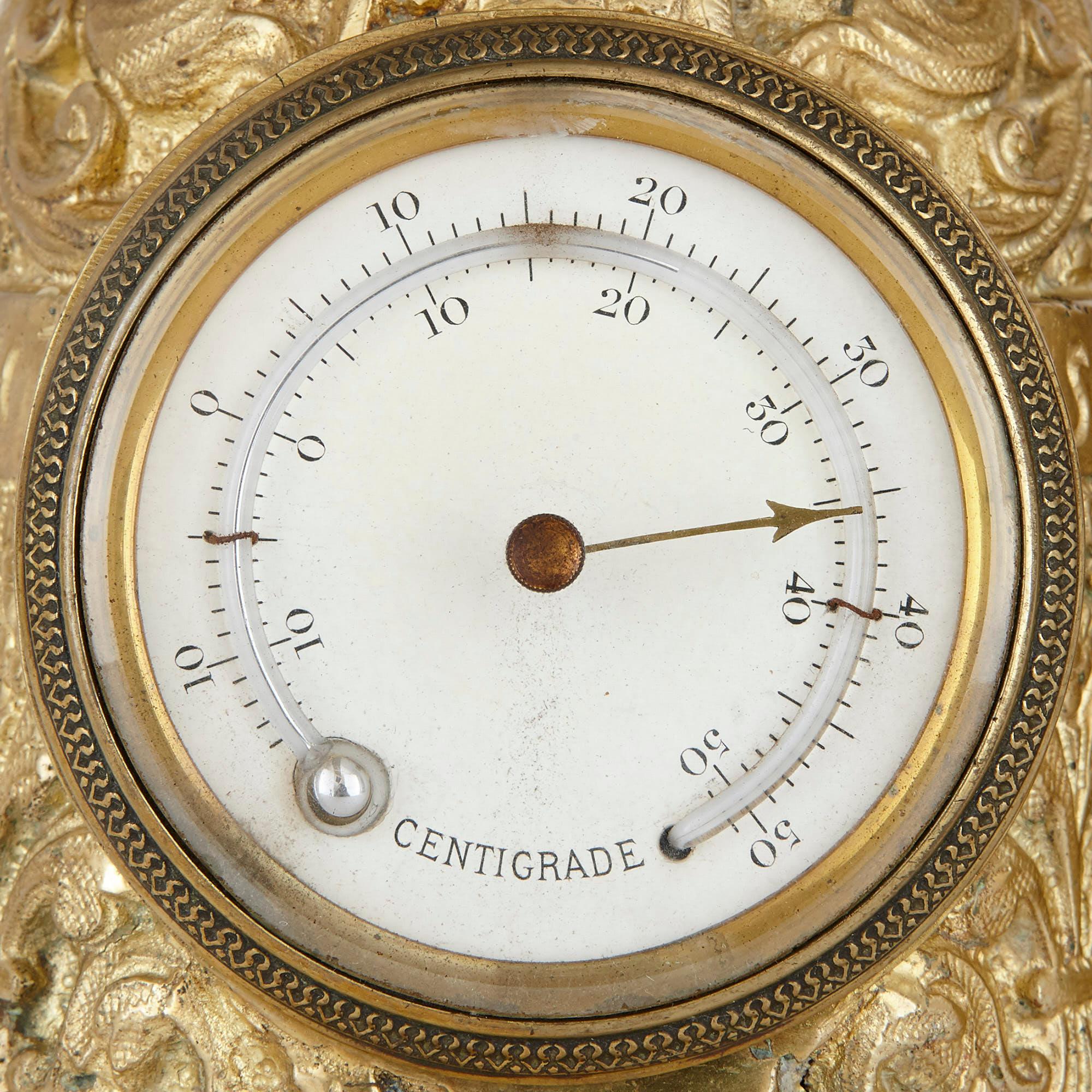 Antique brass clock set with religious decoration In Good Condition For Sale In London, GB