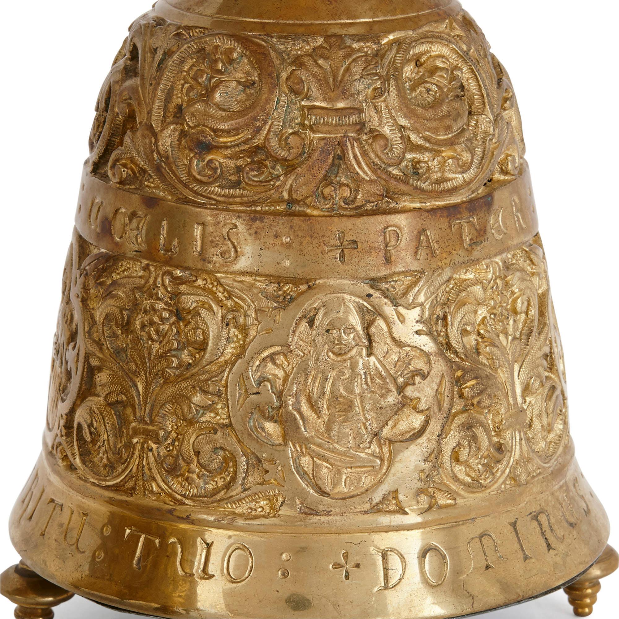 Enamel Antique brass clock set with religious decoration  For Sale