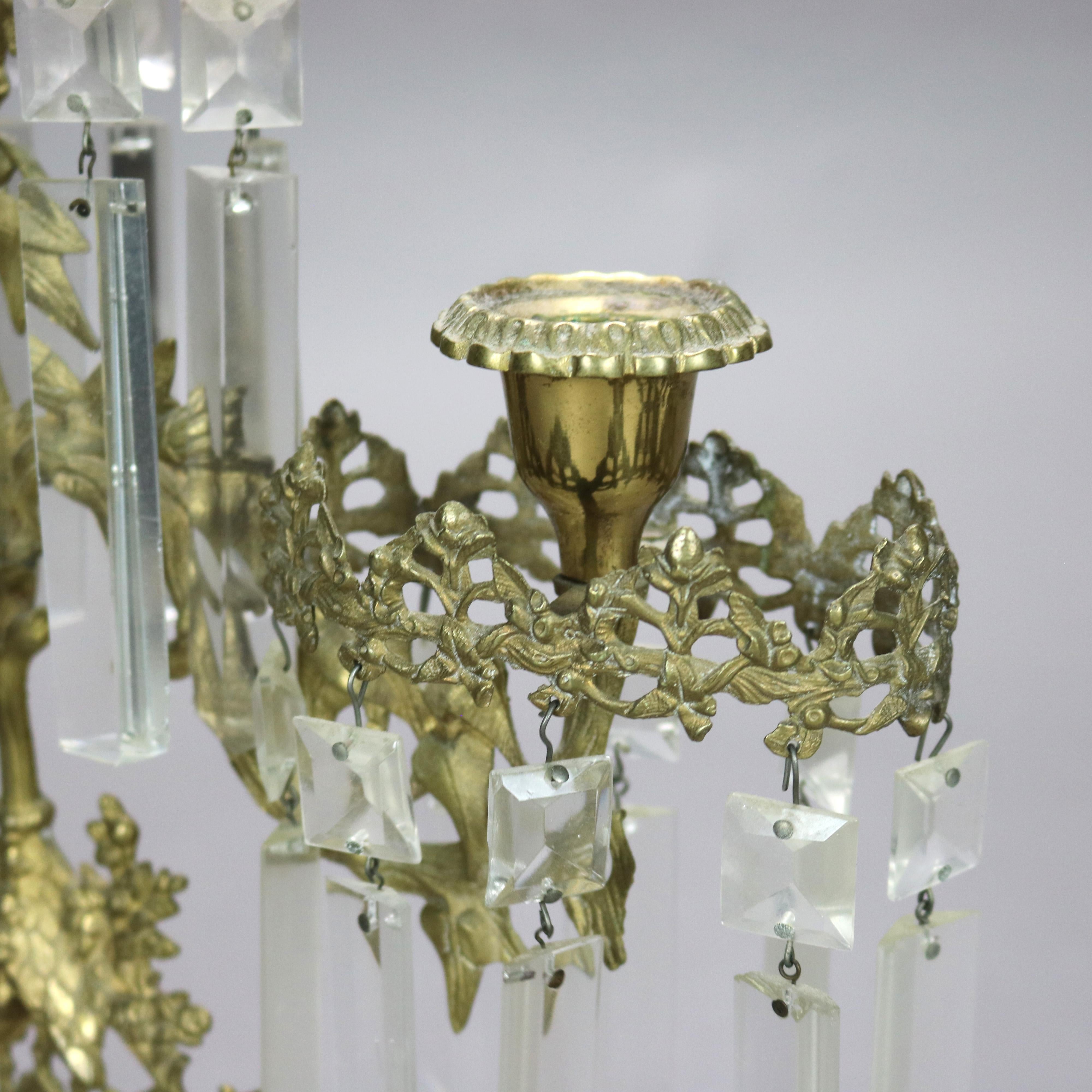 Candelabro Girandole antico in ottone, cristallo e marmo con alveare e orso C1890

Misure - 15