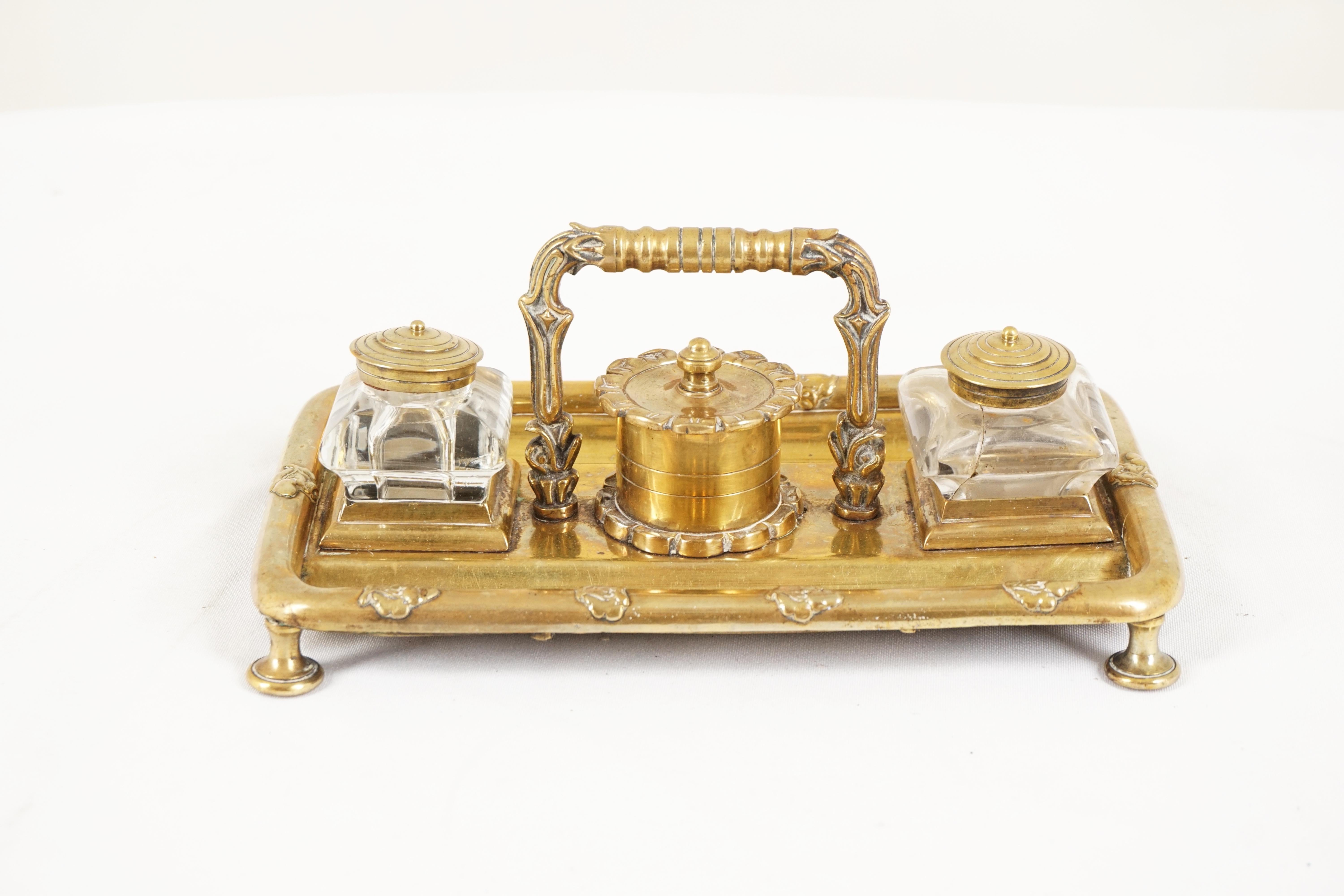 Antique brass double inkwell, Scotland 1900, H545

Scotland 1900
Brass and glass
Inkwell comes with stamp holder and lid
Two glass inkwells (one has a crack and the other has a chip), with brass lids
Two pen rests decorated with nut