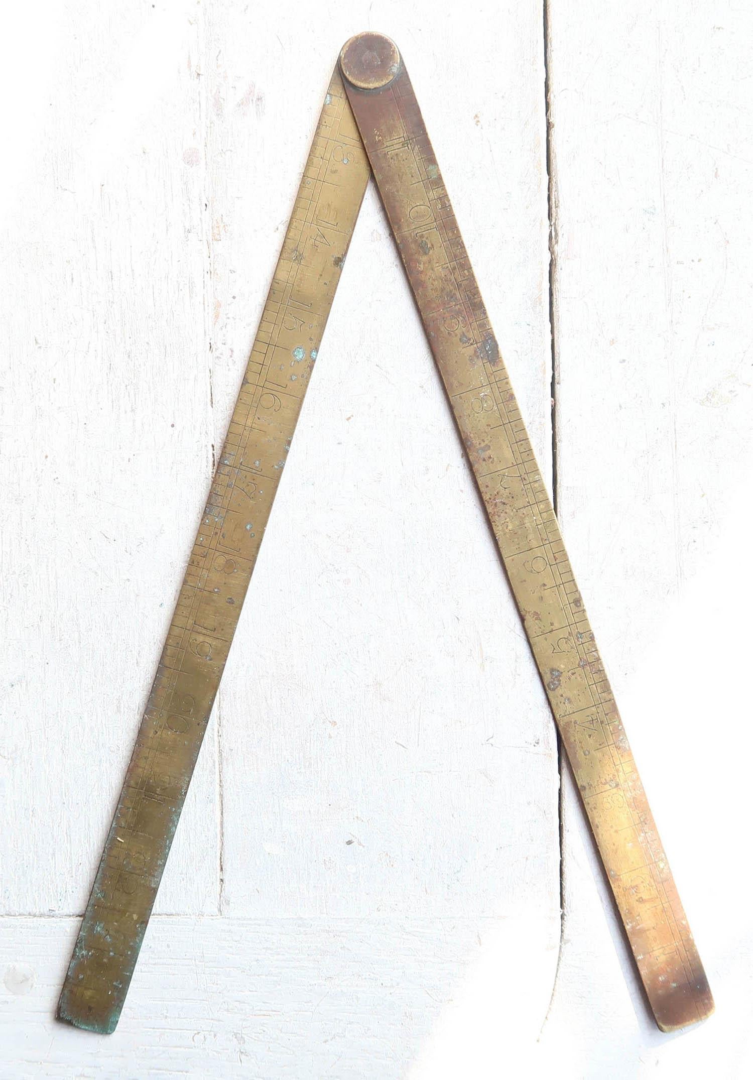 Brass folding ruler.

Folds out to a maximum of 24 inches

Finely engraved numerals

Original patina

No makers mark