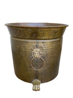Large antique Brass Jardinière with lion motifs and ring handles