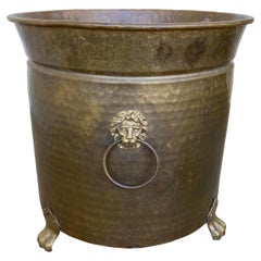 Antique Brass Footed Jardiniere with Lion Motifs and Rings