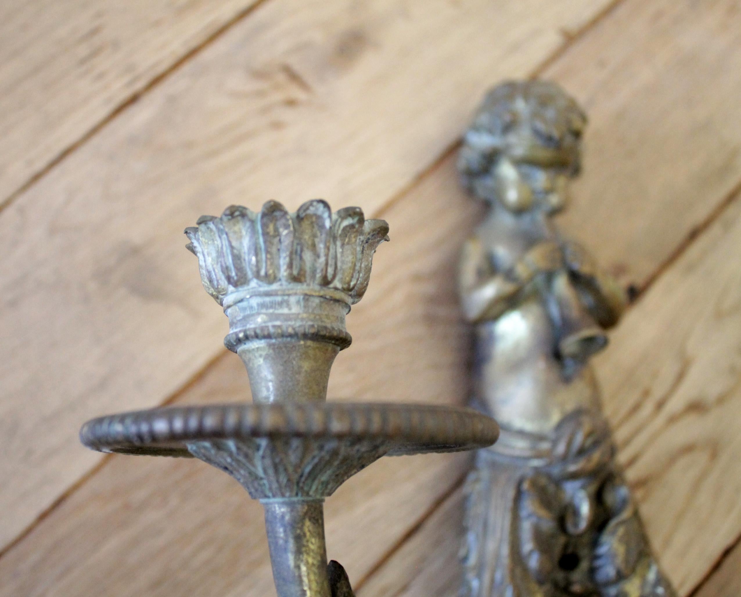 cherub sconces