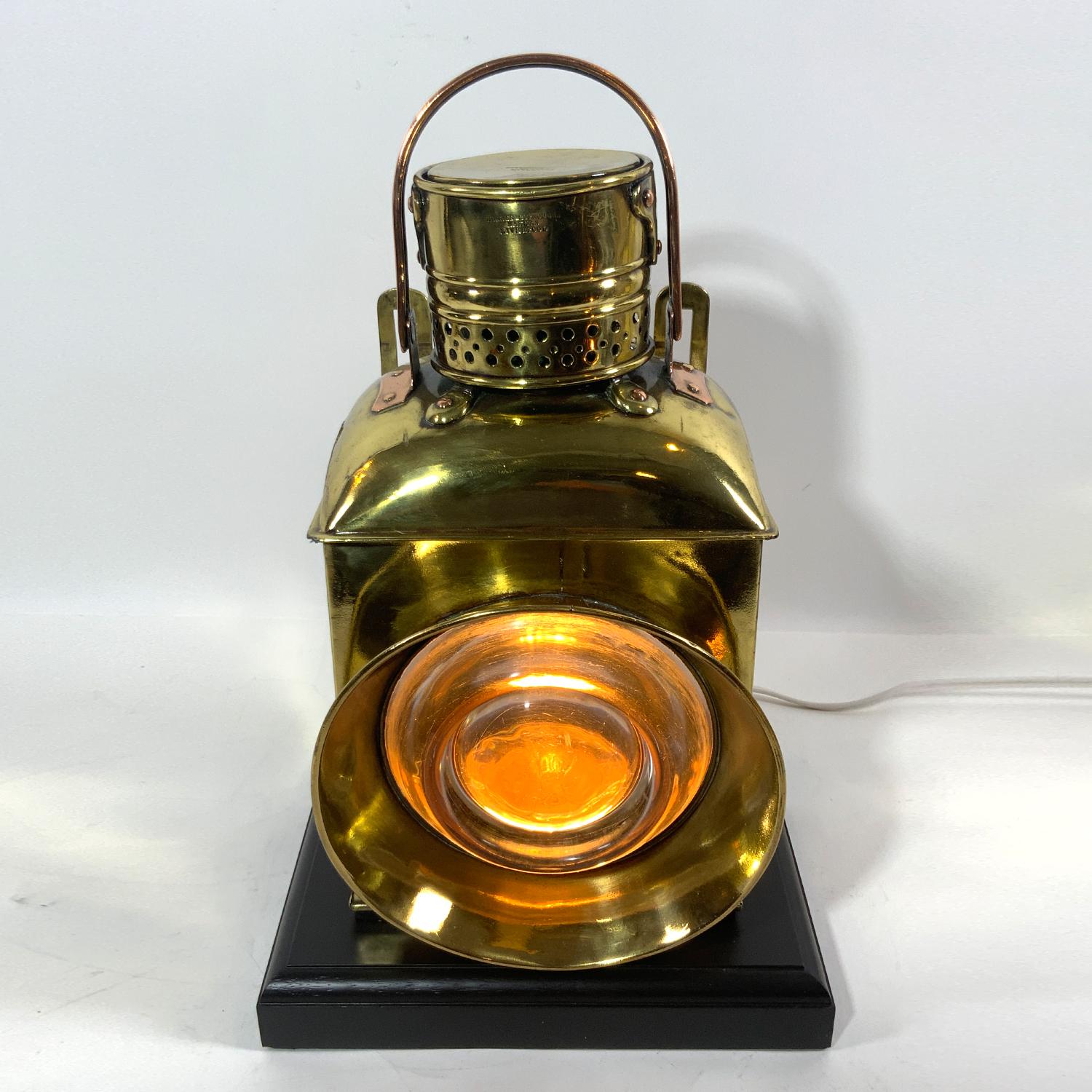 Hughes and Burroughs Lantern with huge dioptric bullseye lens. With mounting brackets, carry handle. Fitted with electric socket for home use. Cap is engraved 