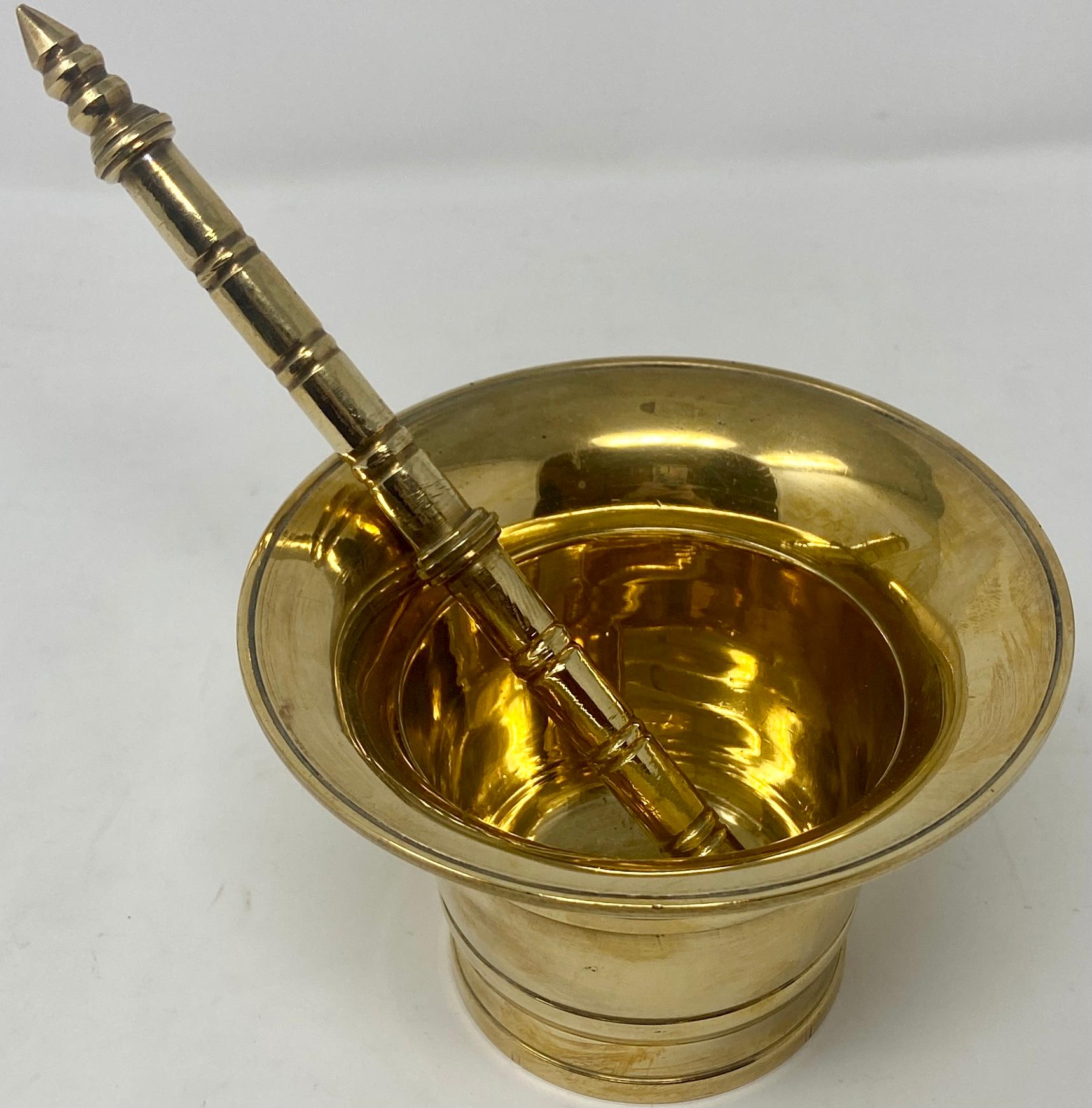 Large antique brass mortar and pestle, Circa 1900-1920
Used in both household Kitchens and Apothecaries / Pharmacies for centuries.