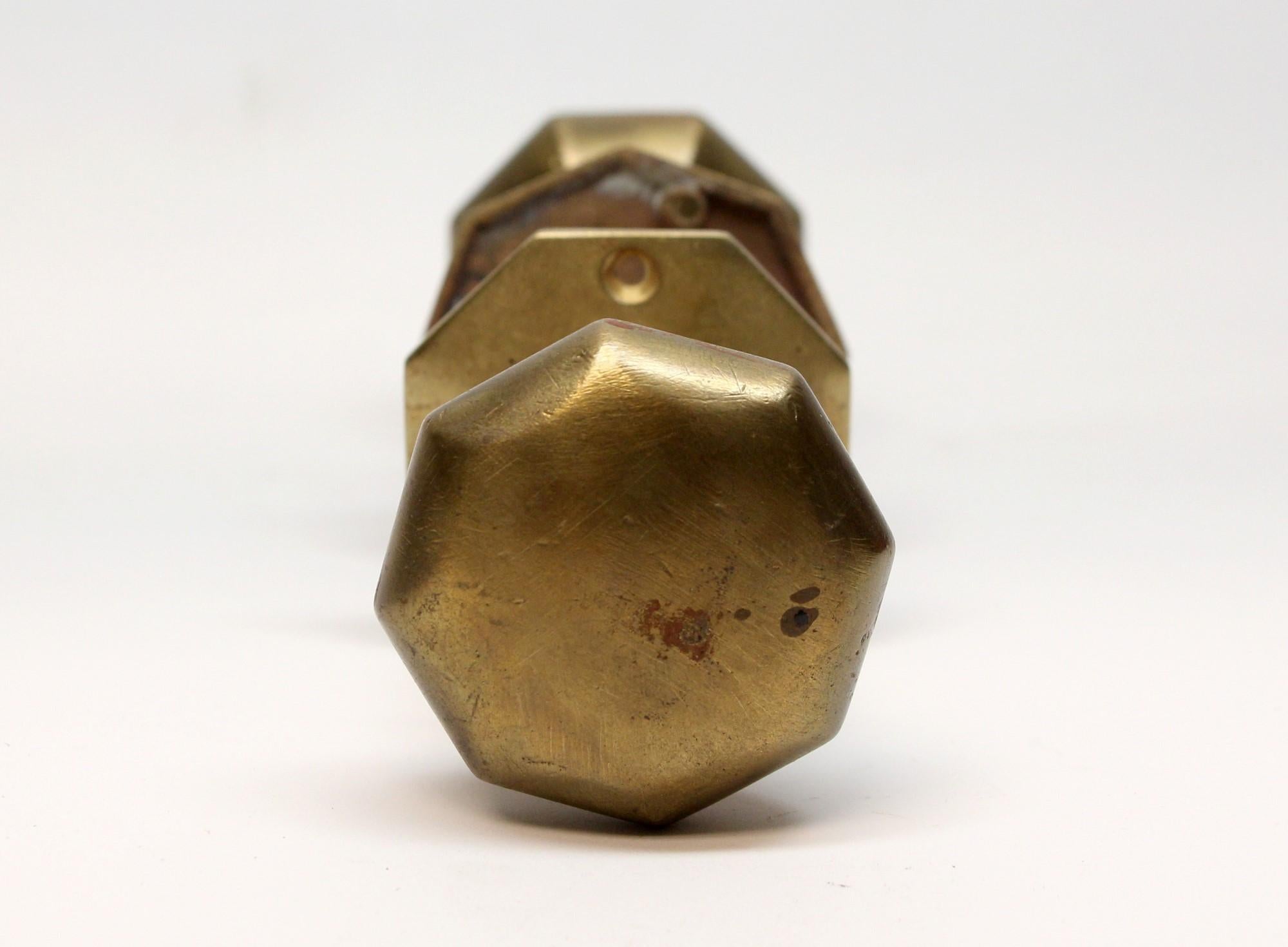 Octagon shaped knobs made of brass in an antique finish. The knobs take a 0.375 in. entry size spindle. Priced includes one pair of knobs with spindle and two matching rosettes. This can be seen at our 400 Gilligan St location in Scranton, PA.