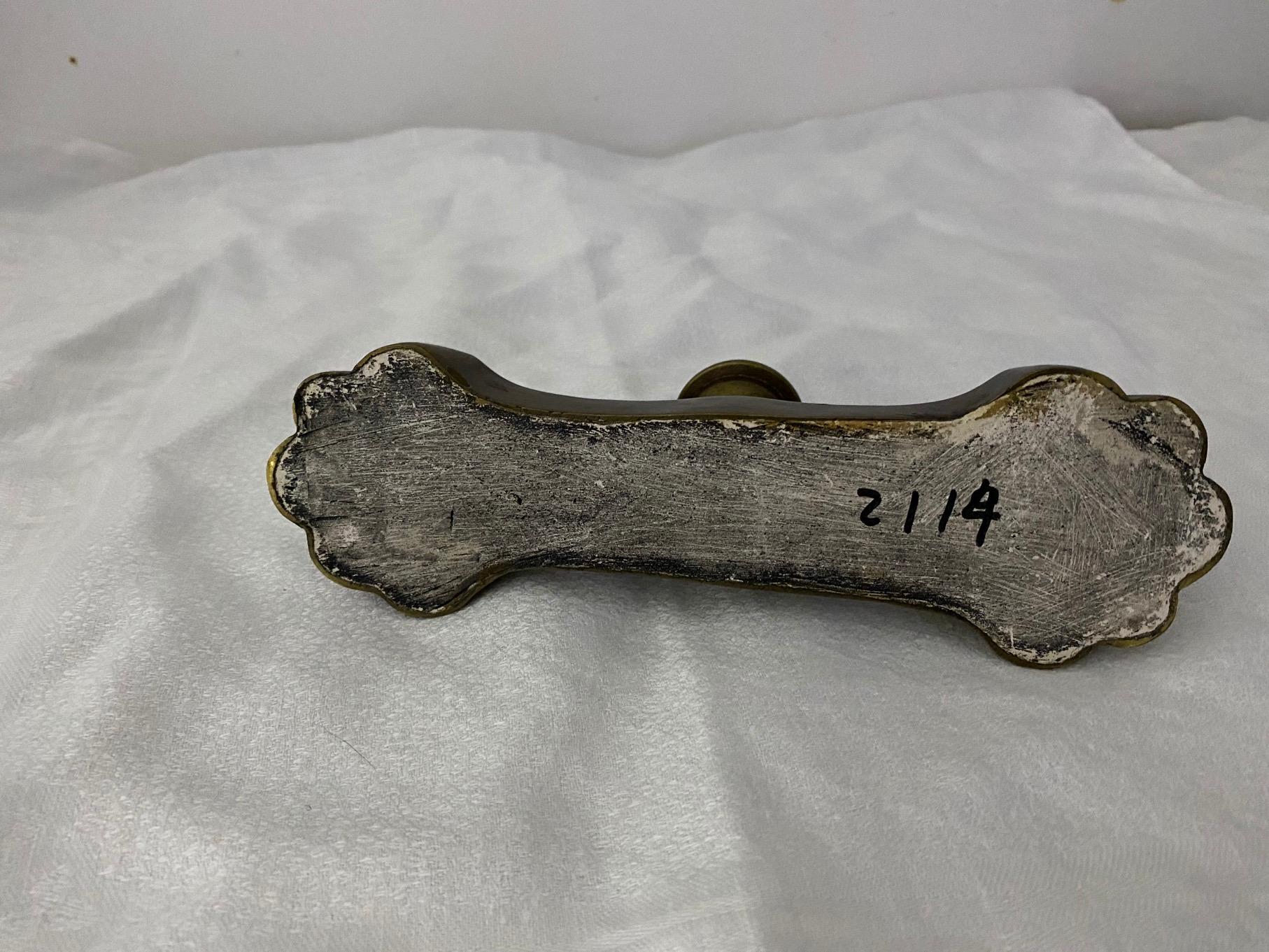 antique brass paperweight