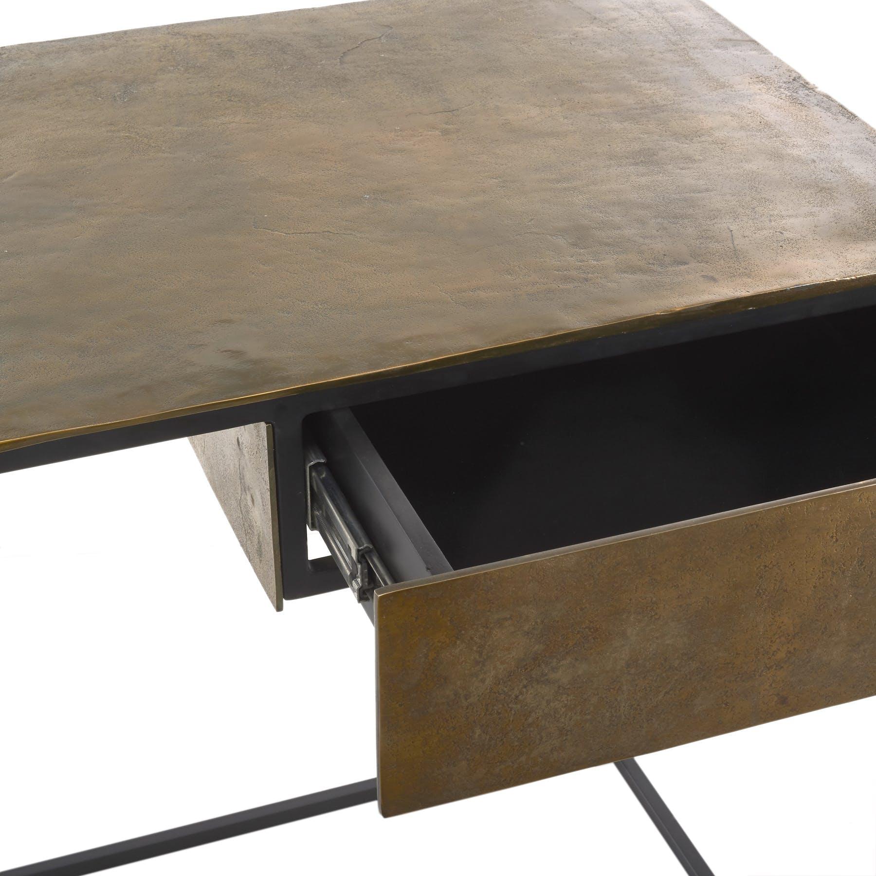 Antique brass-plated desk, Pols Potten Studio.
Dimensions: W 120.5 x D 51 x H 75.5 cm.
Materials: Black powder-coated iron frame, aluminum, antique brass-plated top.


Pols Potten products are characterized by a modern twist on Traditional
