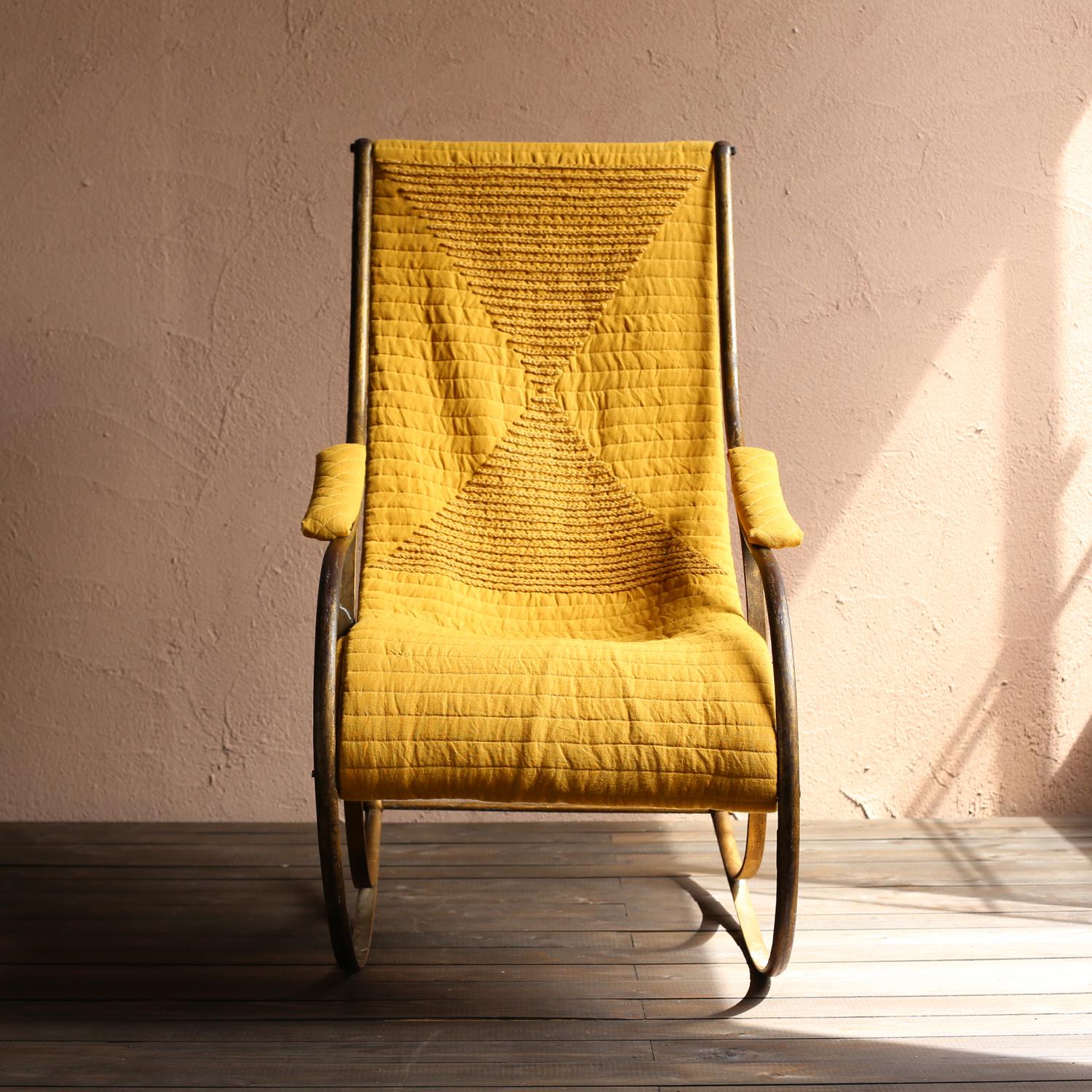 Antique brass rocking chair from Sweden.
The seat was made by the Japanese contemporary design unit 