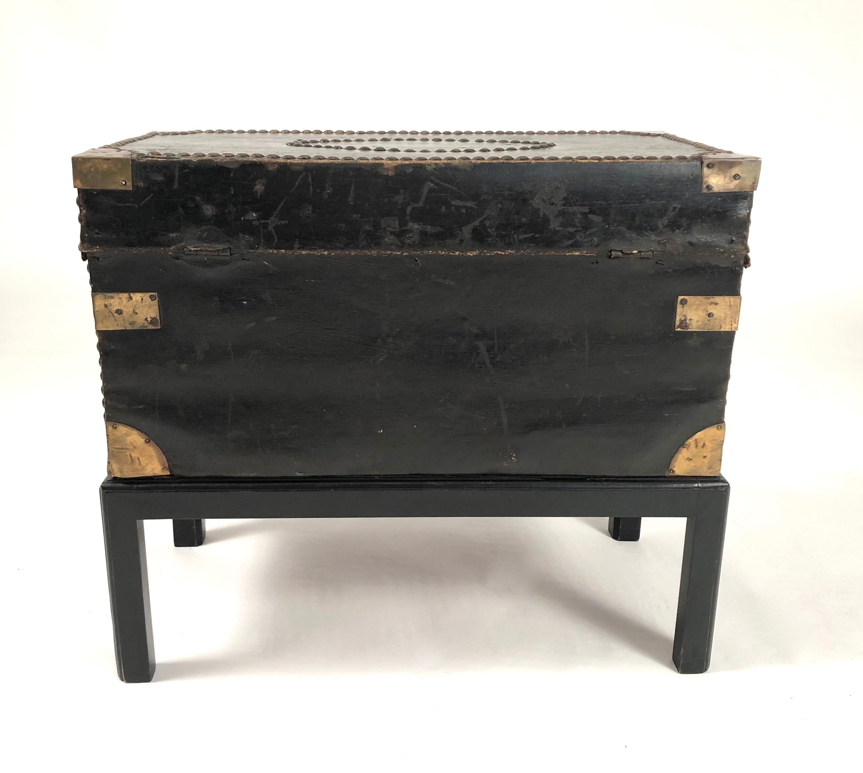 Painted Brass Stud Decorated Leather Sea Captain's Chest on Stand, circa 1810-1820