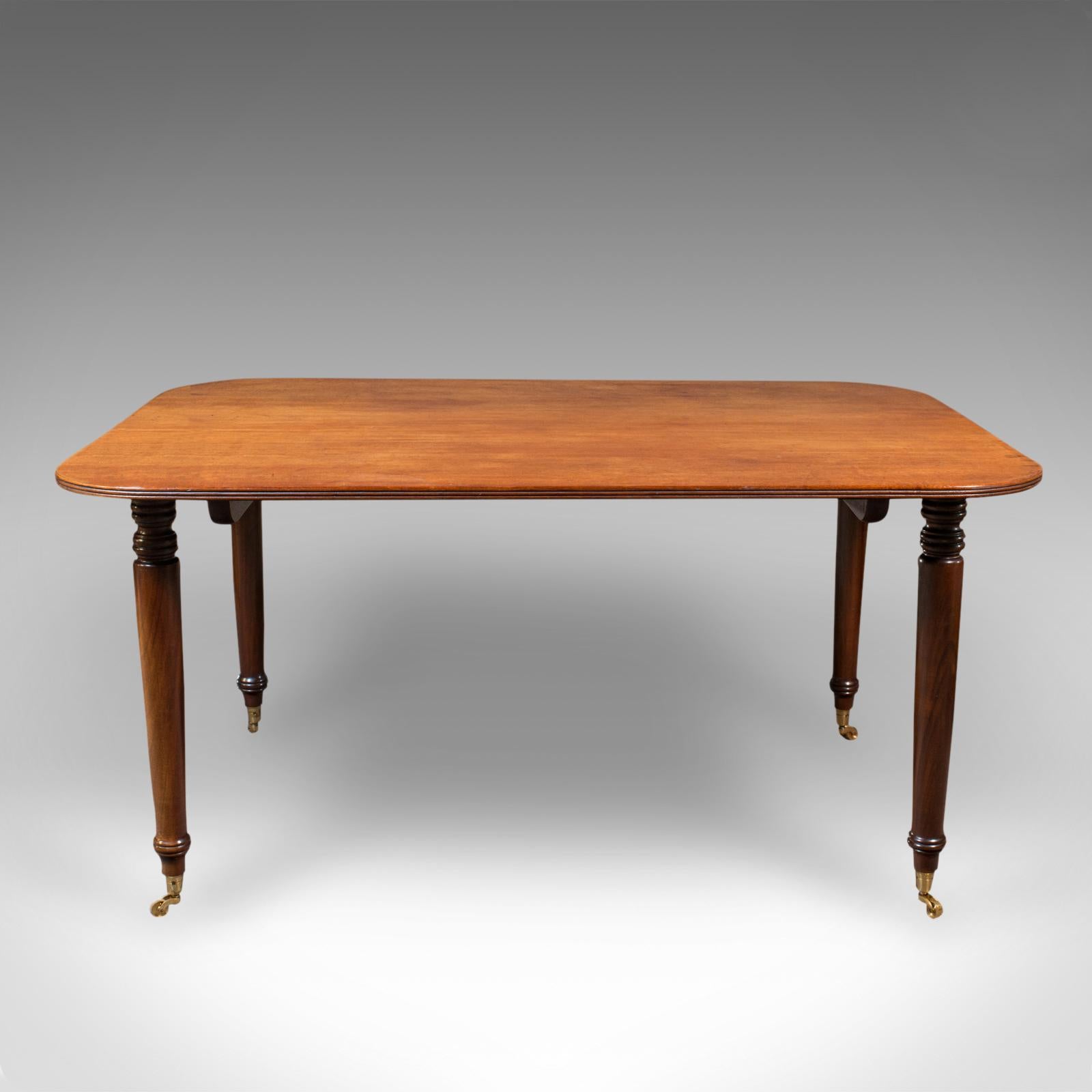 This is an antique breakfast table. An English, mahogany 4-6 seat dining table, dating to the Victorian period and later, circa 1900.

Generously sized for dining with loved ones or small social gatherings
Displays a desirable aged patina and in