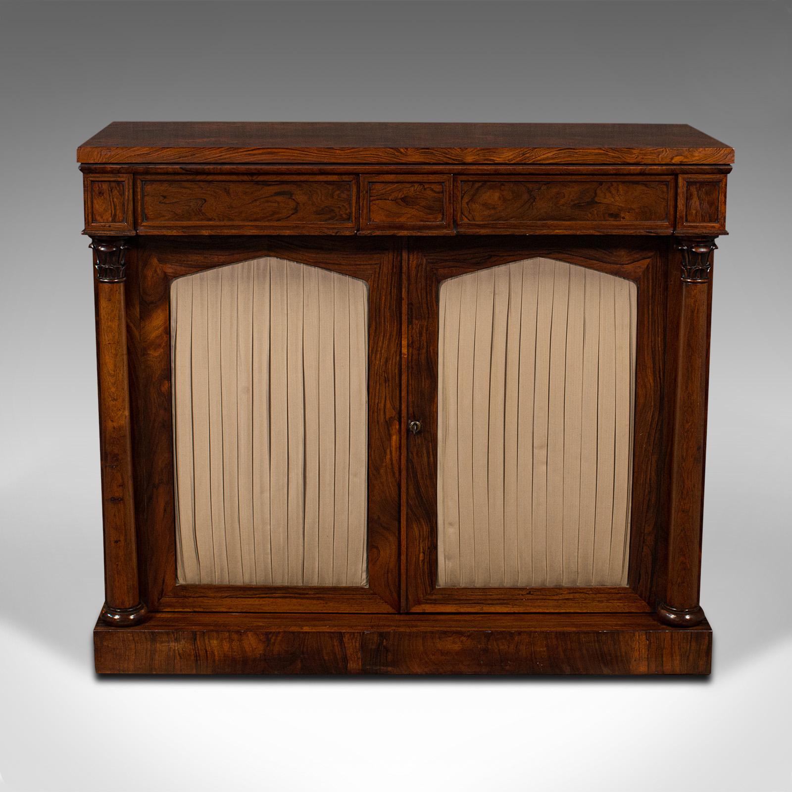 This is an antique breakfront book cabinet. An English, rosewood chiffonier or sideboard, dating to the William IV period period, circa 1830.

Superb William IV craftsmanship with striking grain and colour
Displays a desirable aged patina and in