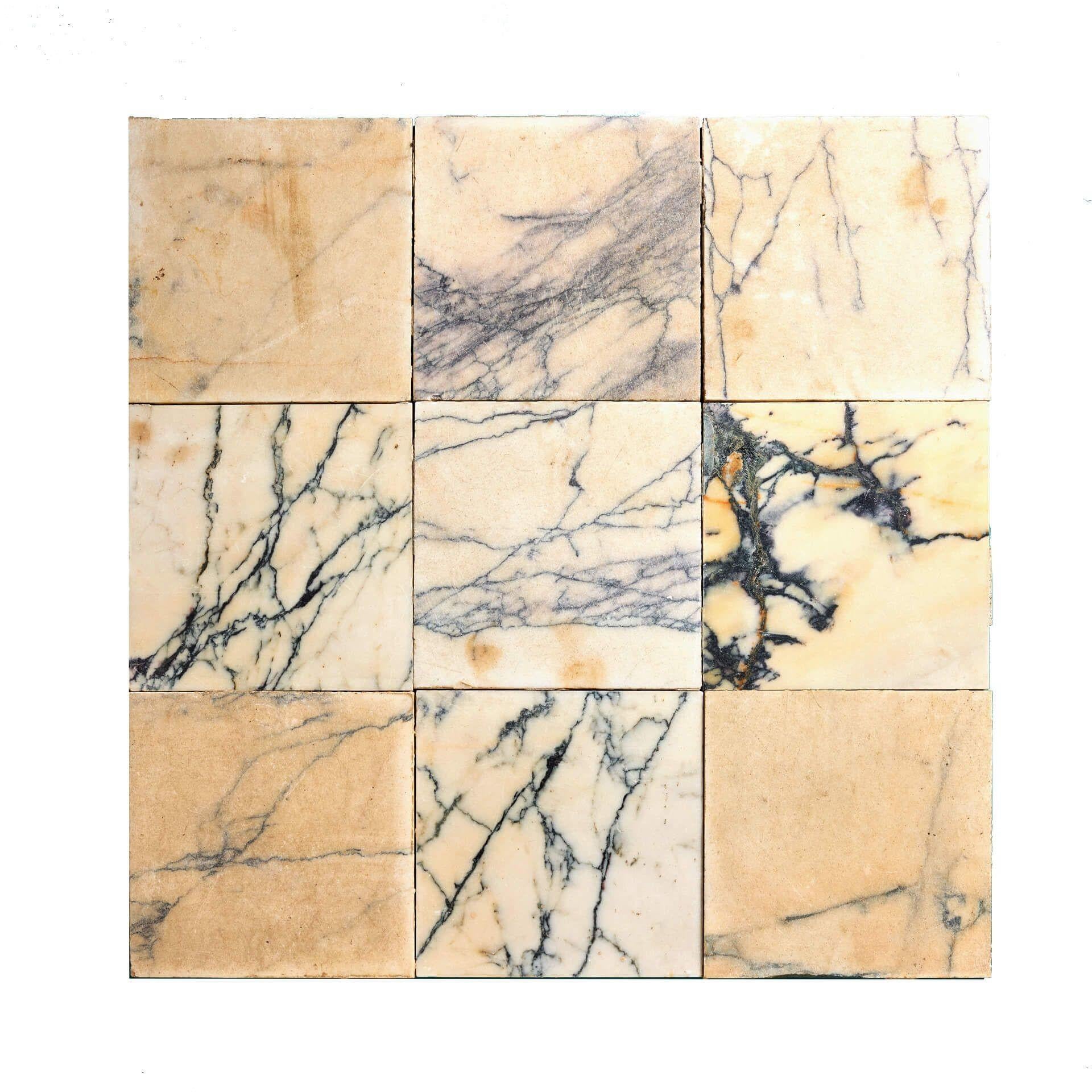 These late 19th century reclaimed Italian floor tiles in Breccia marble were salvaged from Wingfield castle in England.

Dating from circa 1880, these reclaimed floor tiles are of a Italianate style, made in smooth Breccia marble, and detailed with