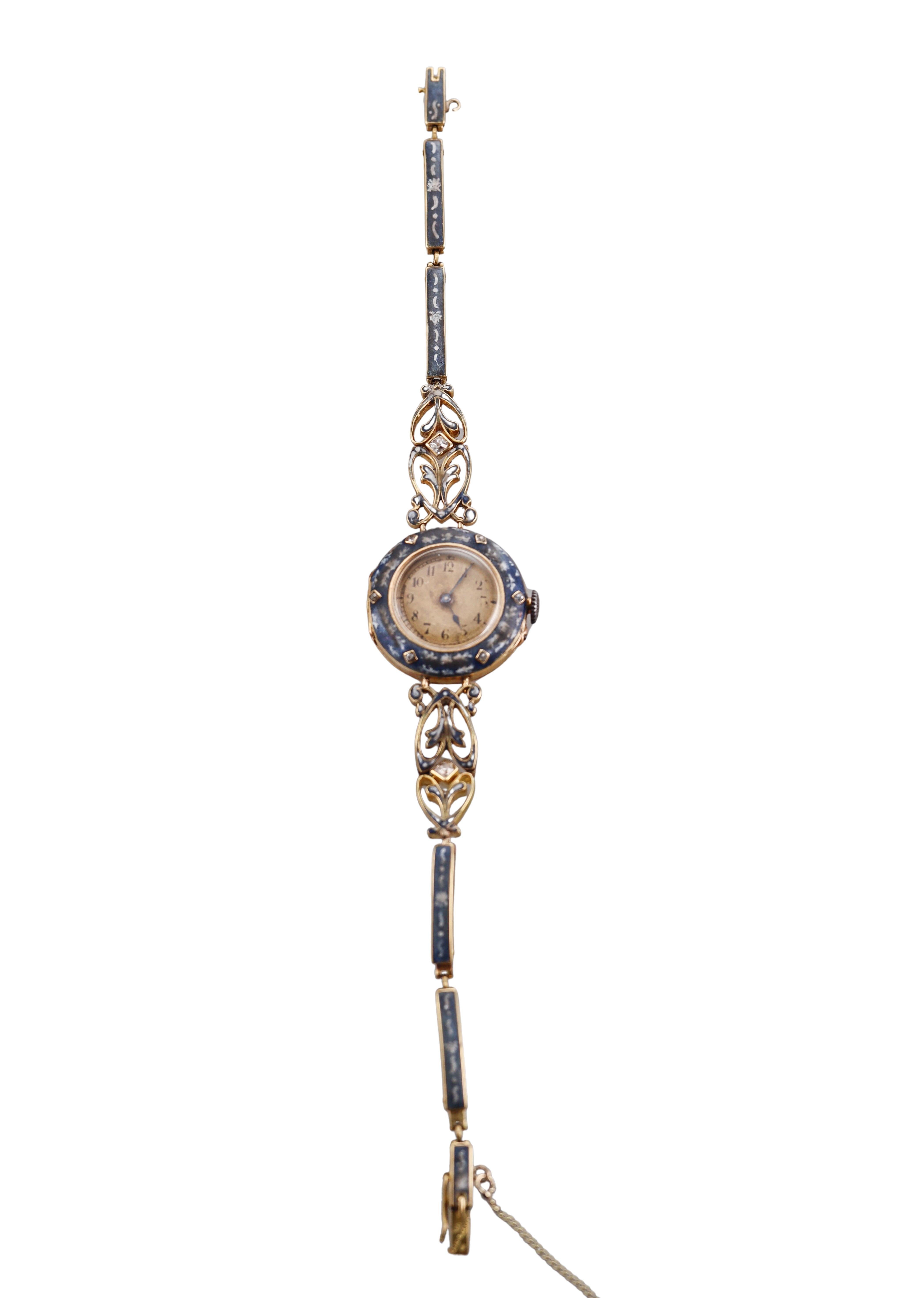Antique 18k yellow gold Brevett watch bracelet, adorned with diamonds and enamel (minor loss is present). 
Bracelet is 7.5