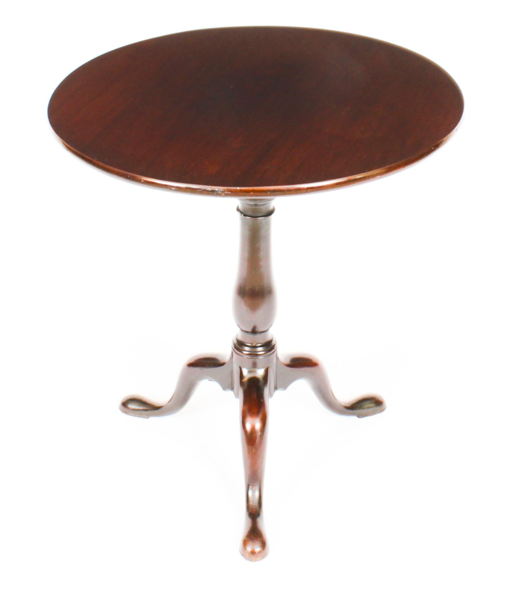 This is an elegantly proportioned antique Chippendale Period  occasional table circa 1765 in date.

This table has been masterfully crafted in  Cuban Mahogany with a birdcage circular tip top which allows it to revolve and tilt, raised on a finely