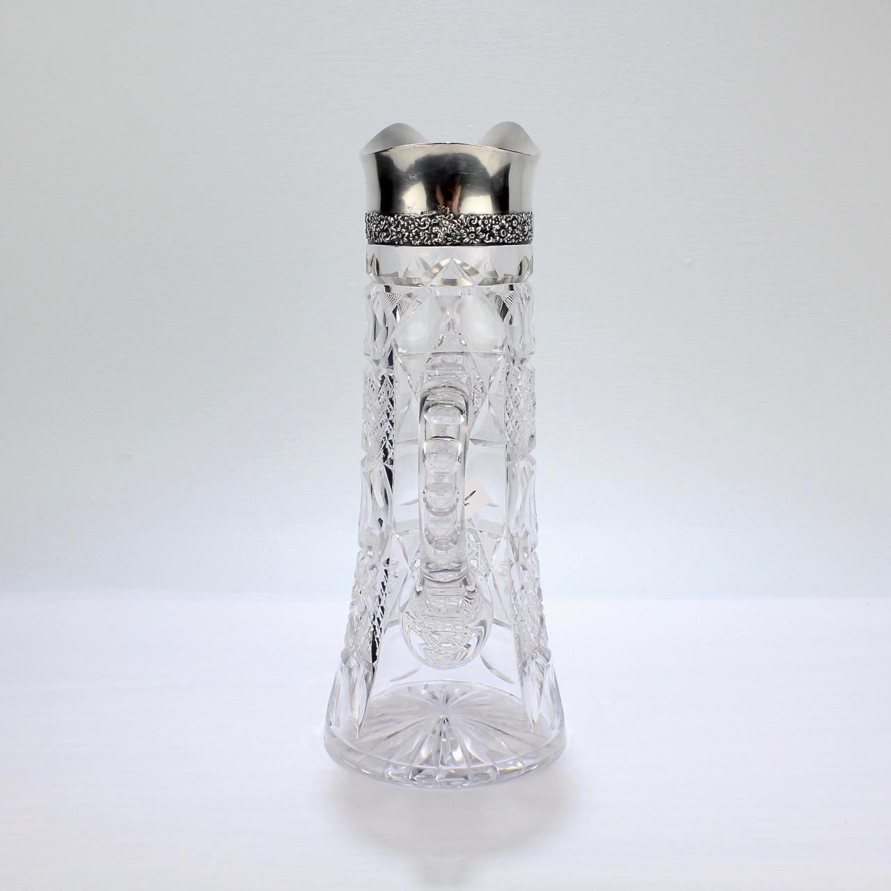 crystal pitcher with silver top