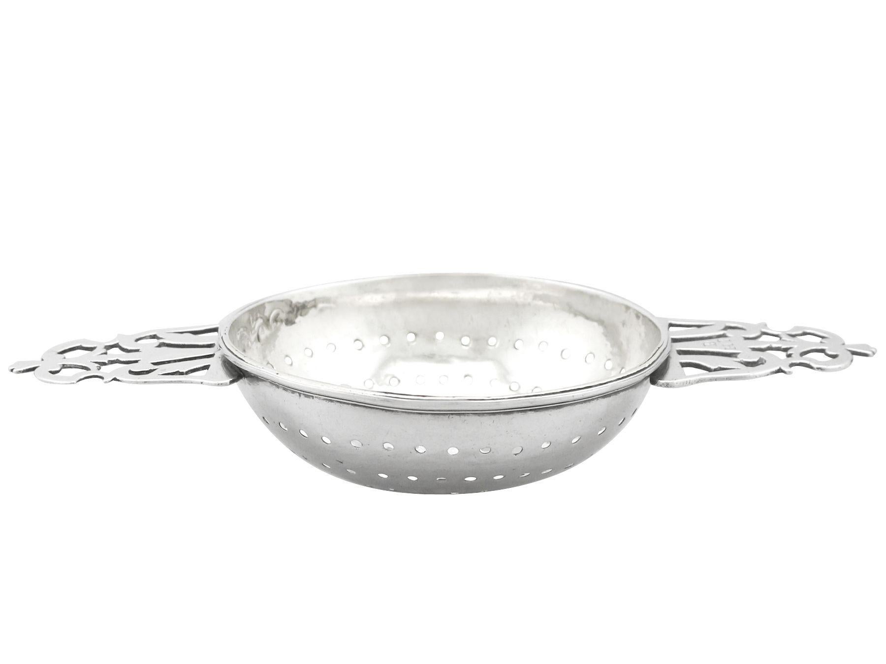 An exceptional, fine and impressive antique Georgian English Britannia standard silver lemon strainer, an addition to our range of collectable, 18th century silverware

This exceptional antique George I English Britannia standard silver lemon