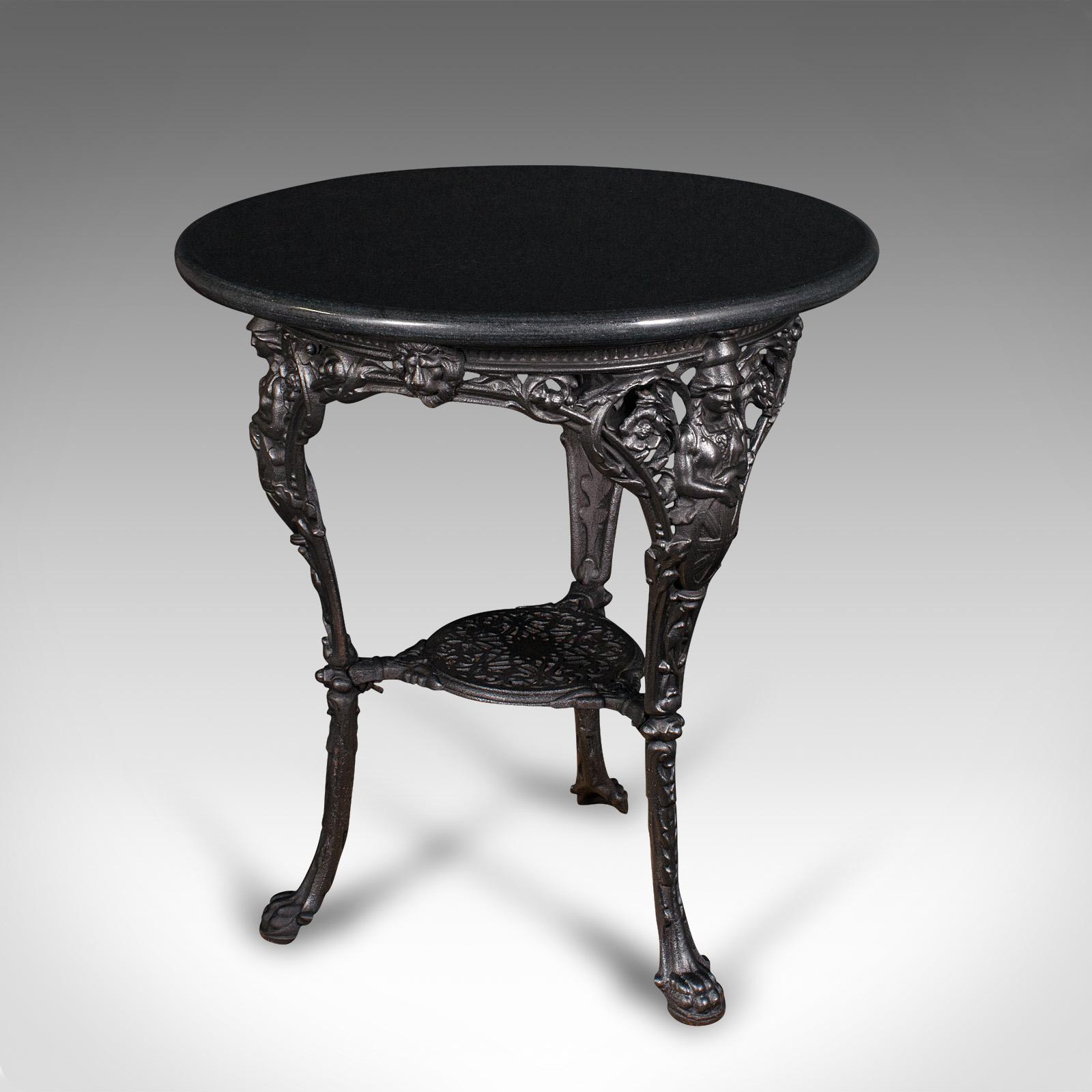 This is an antique Britannia table. An English, cast iron and marble circular wine or side table, dating to the early Victorian period, circa 1850.

Captivating example with finely cast base detail and deep tonality
Displays a desirable aged patina
