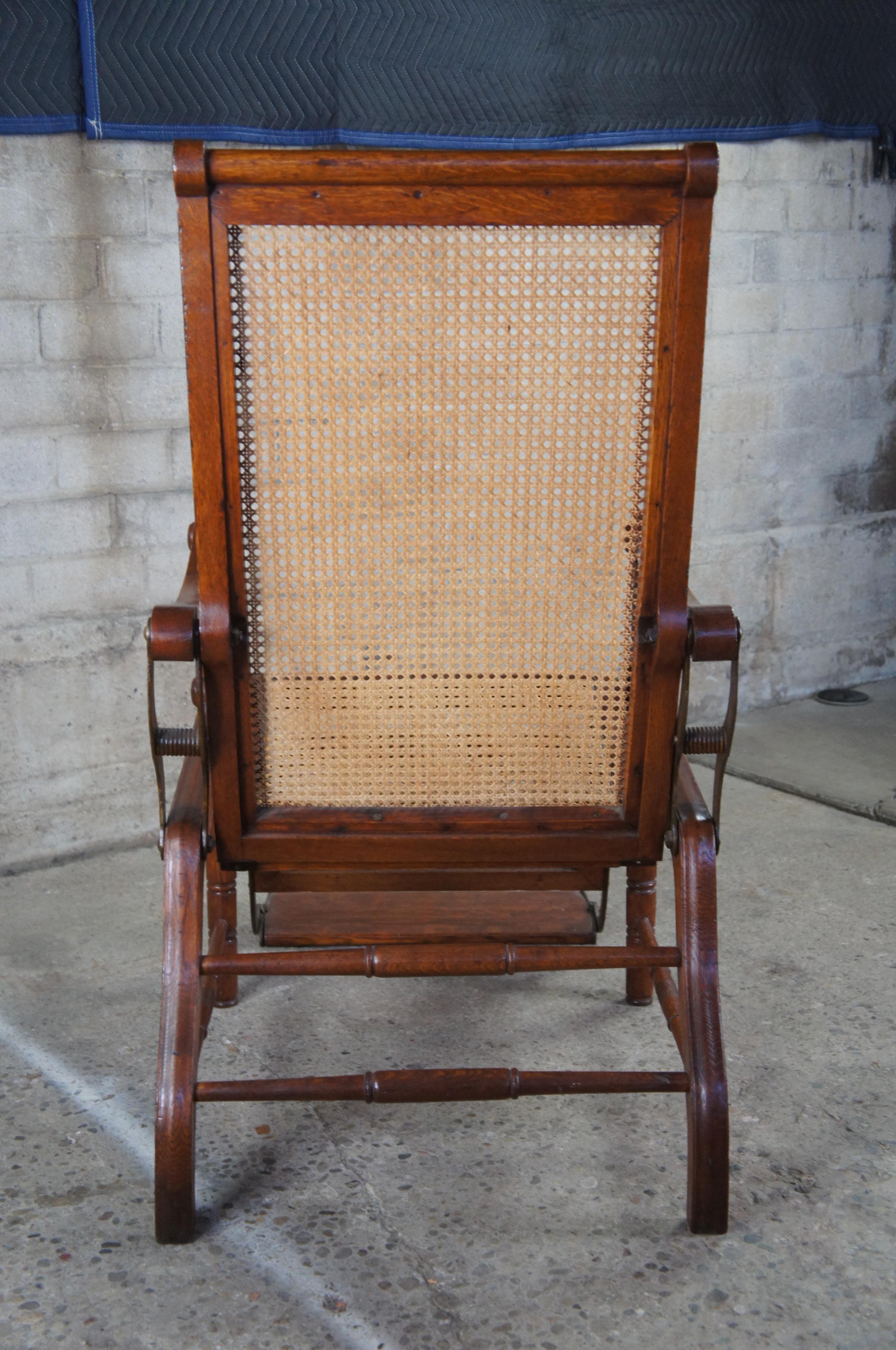 Antique British Colonial 1830s Caned Oak Reclining Mechanical Dental Arm Chair In Good Condition For Sale In Dayton, OH