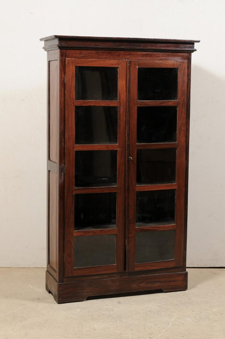 Antique British Colonial Rosewood, Tall China Cabinets With Glass Doors
