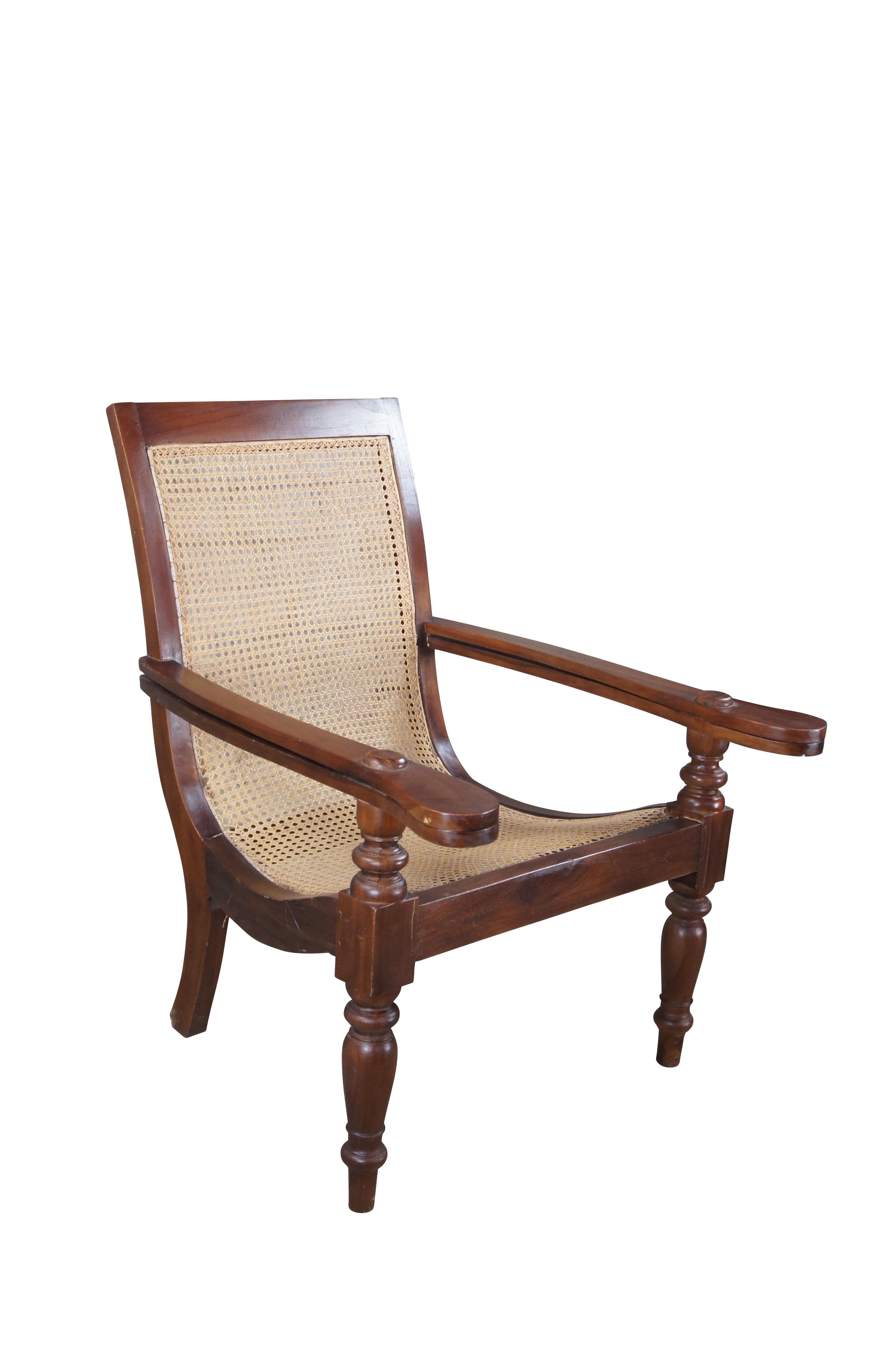 Anglo-Indian Antique British Colonial Anglo Indian Teak Extendable Arm Caned Plantation Chair