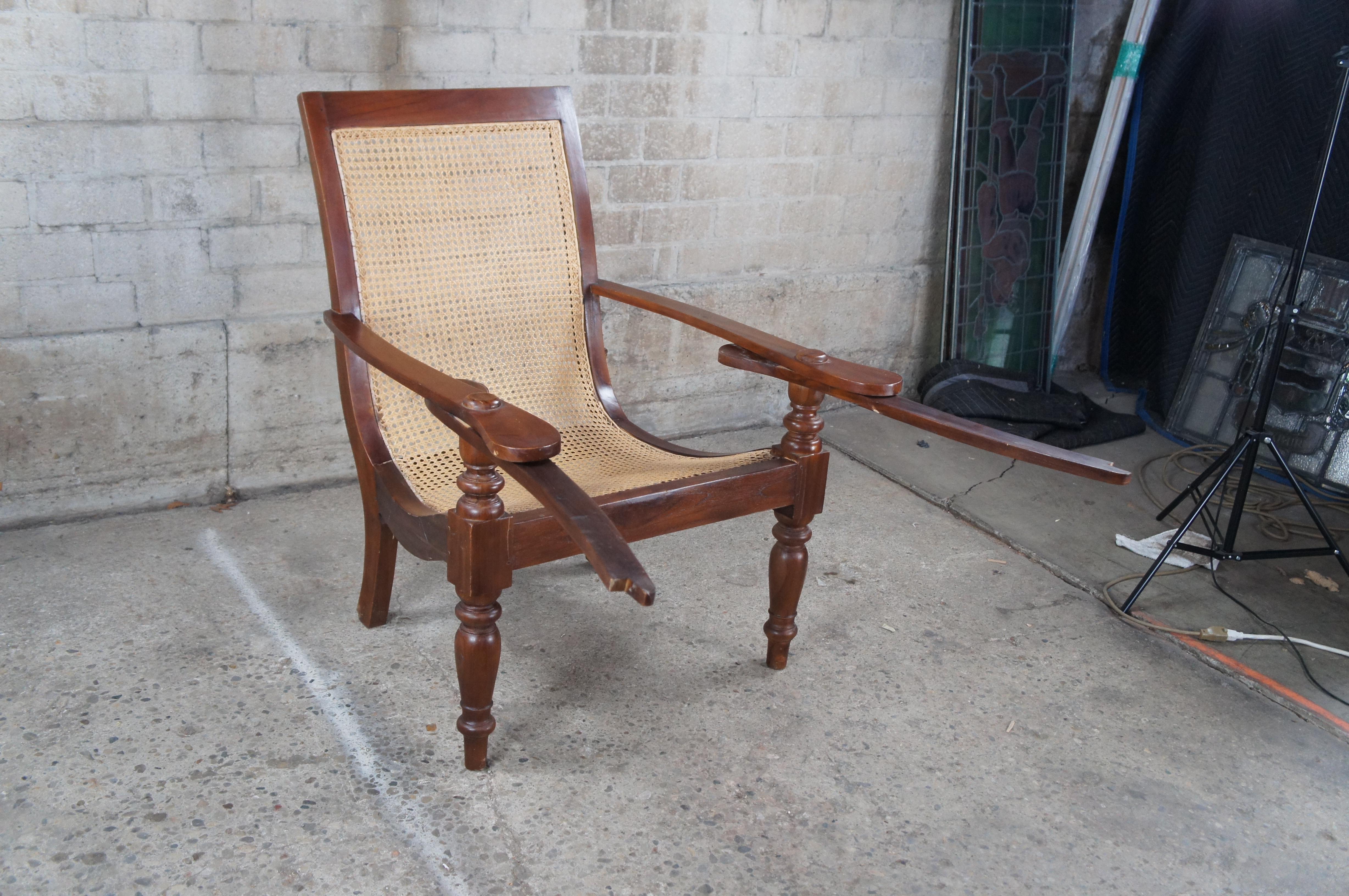 Antique British Colonial Anglo Indian Teak Extendable Arm Caned Plantation Chair In Good Condition In Dayton, OH