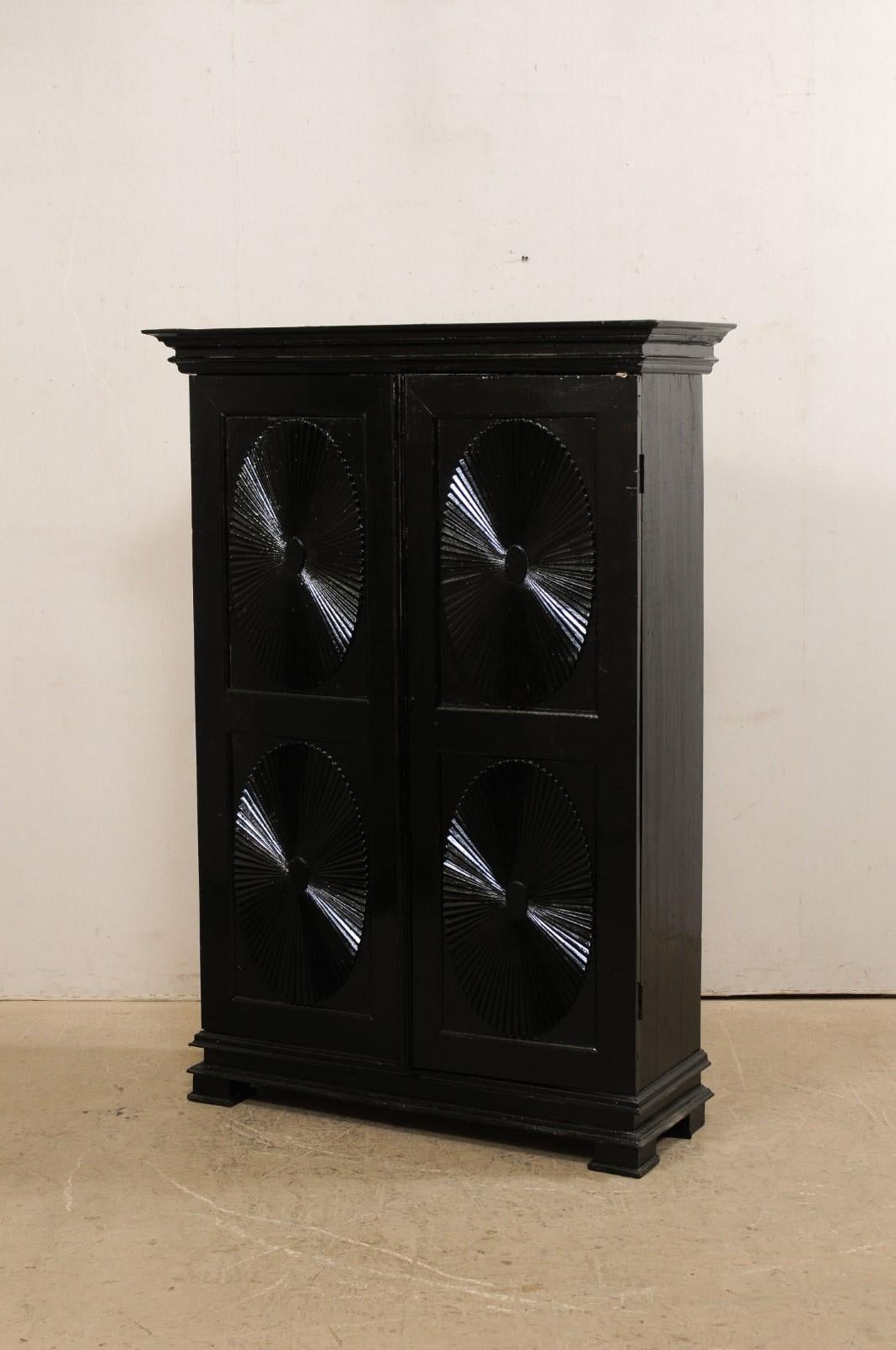 Antique British Colonial Black Armoire Cabinet with Raised Oval-Panel Doors 2