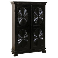Antique British Colonial Black Armoire Cabinet with Raised Oval-Panel Doors