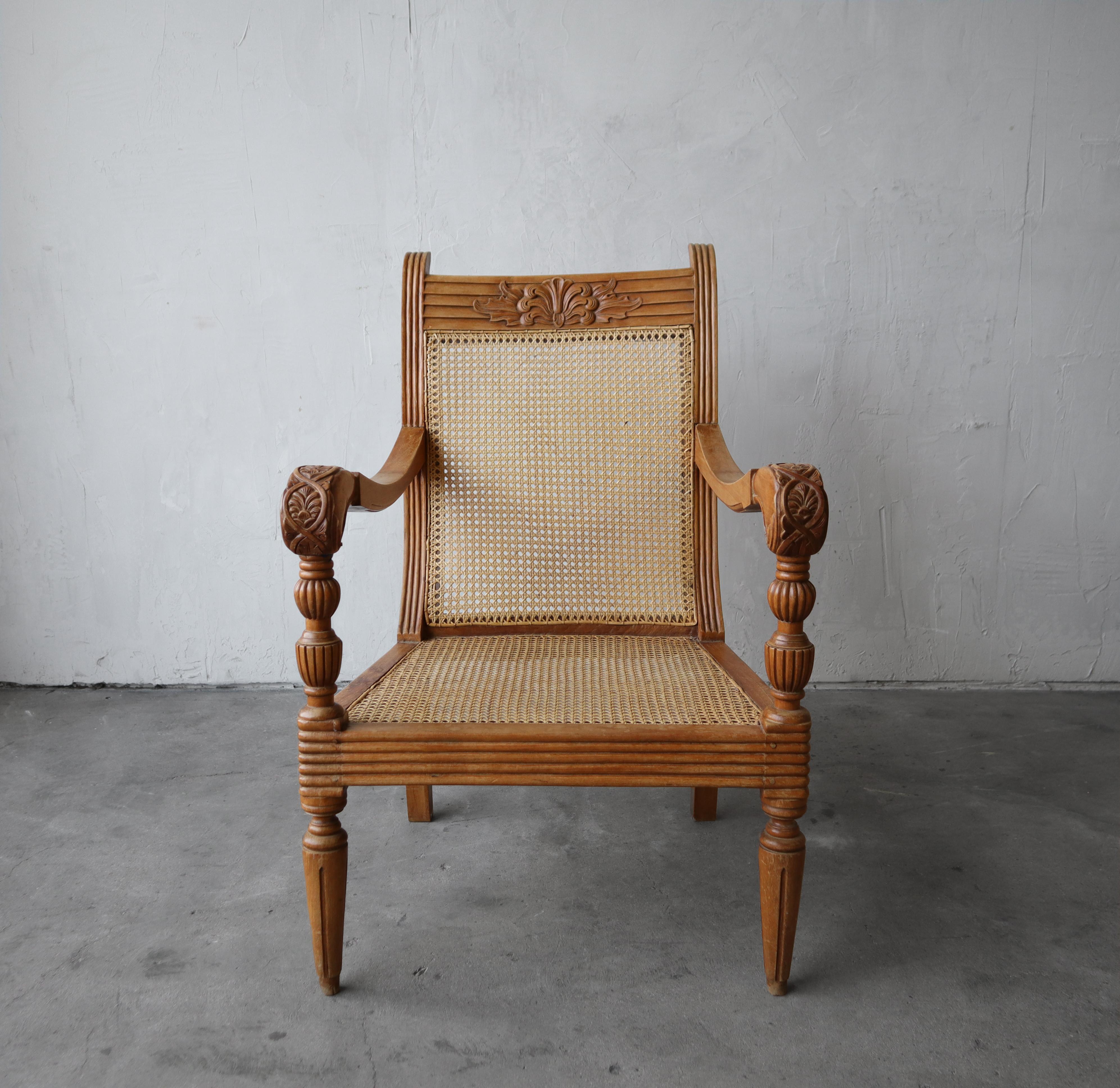 20th Century Antique British Colonial Cane and Carved Teak Lounge Chair For Sale