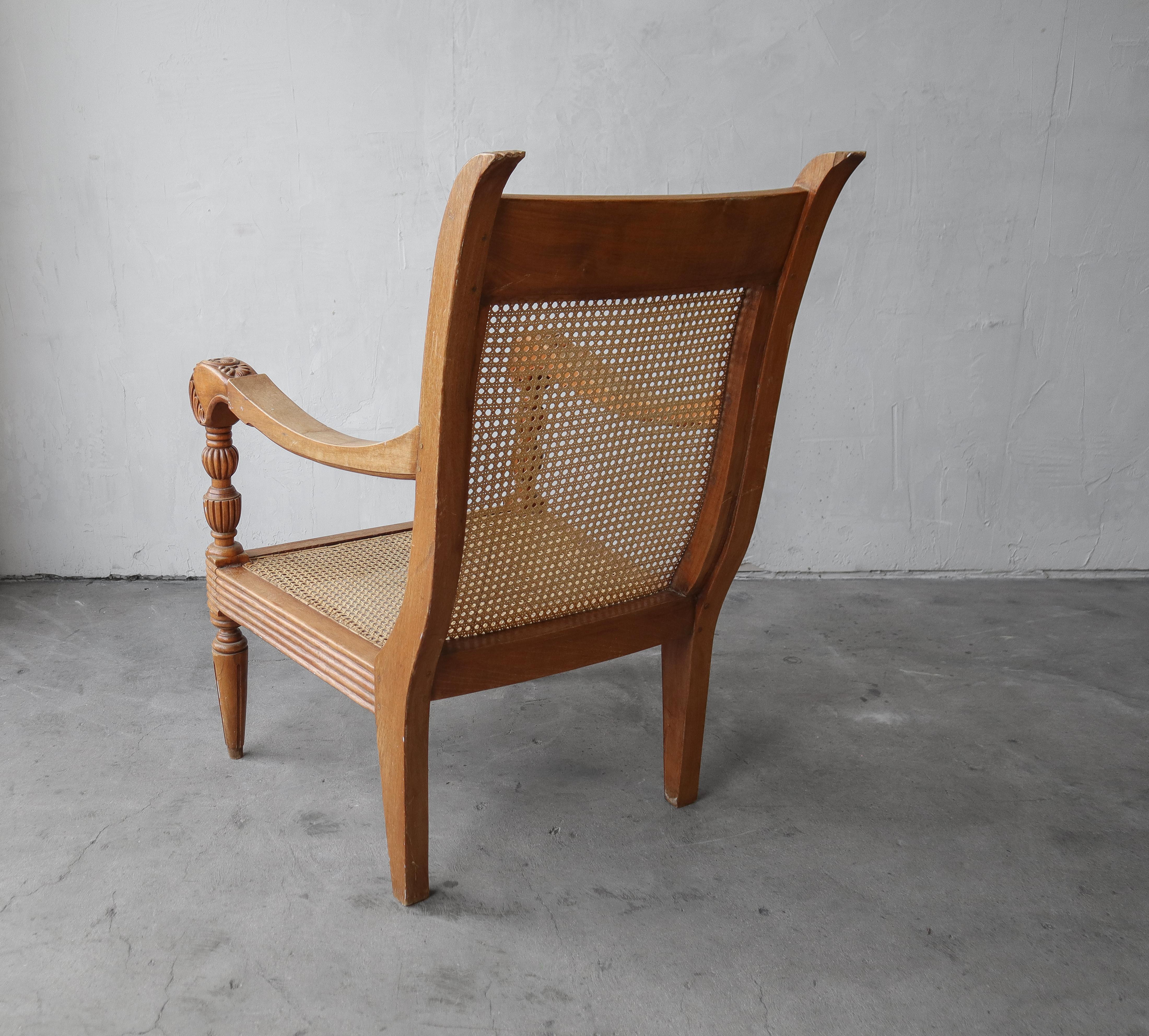 Antique British Colonial Cane and Carved Teak Lounge Chair For Sale 4