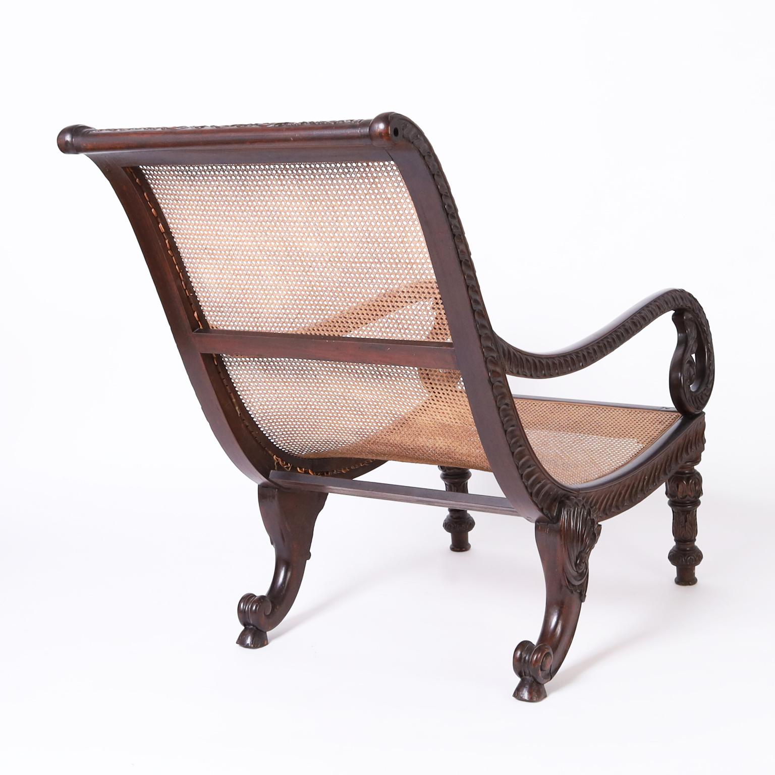 Caribbean Antique British Colonial Caned and Carved Planters Chair For Sale