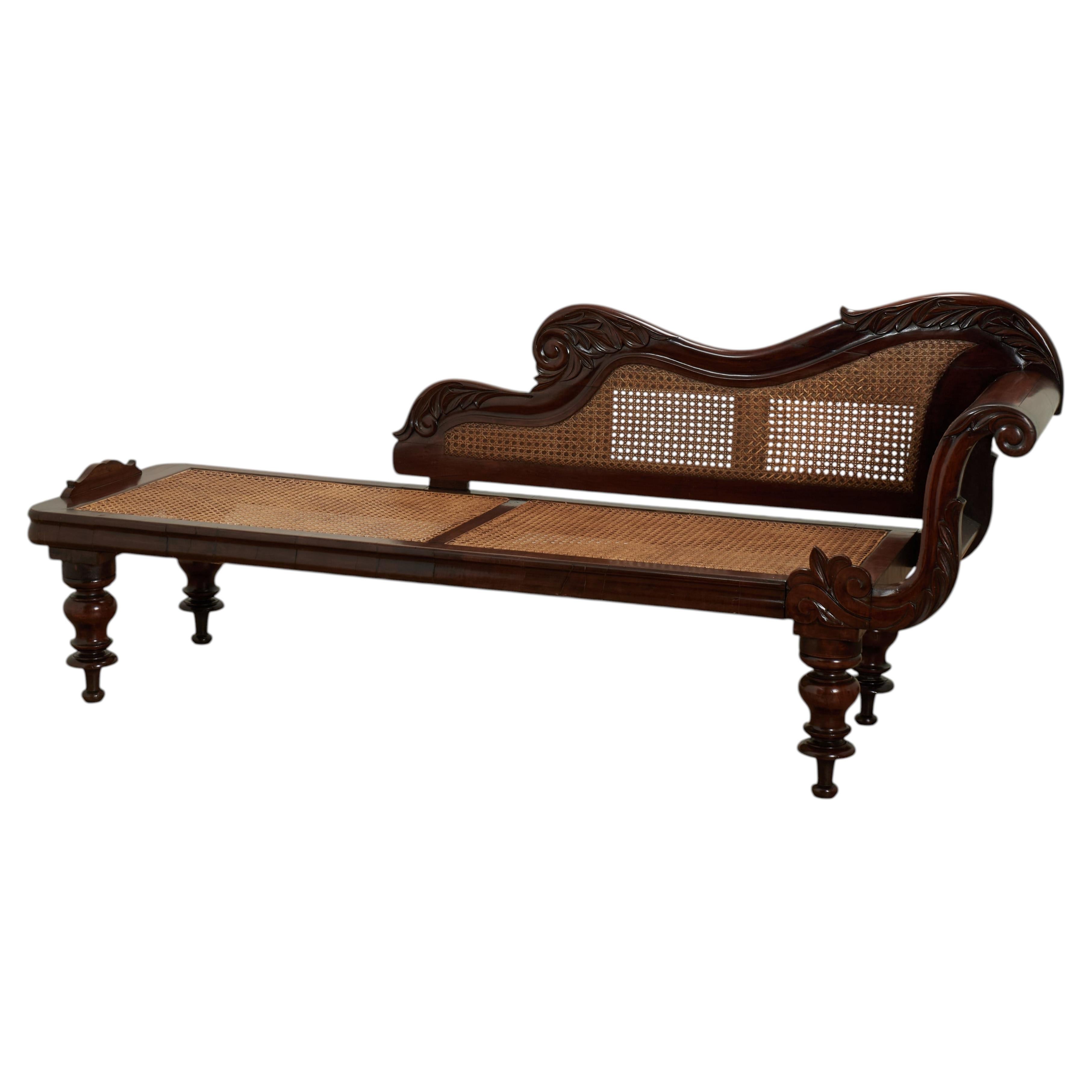 Antique British Colonial Caned Chaise Lounge