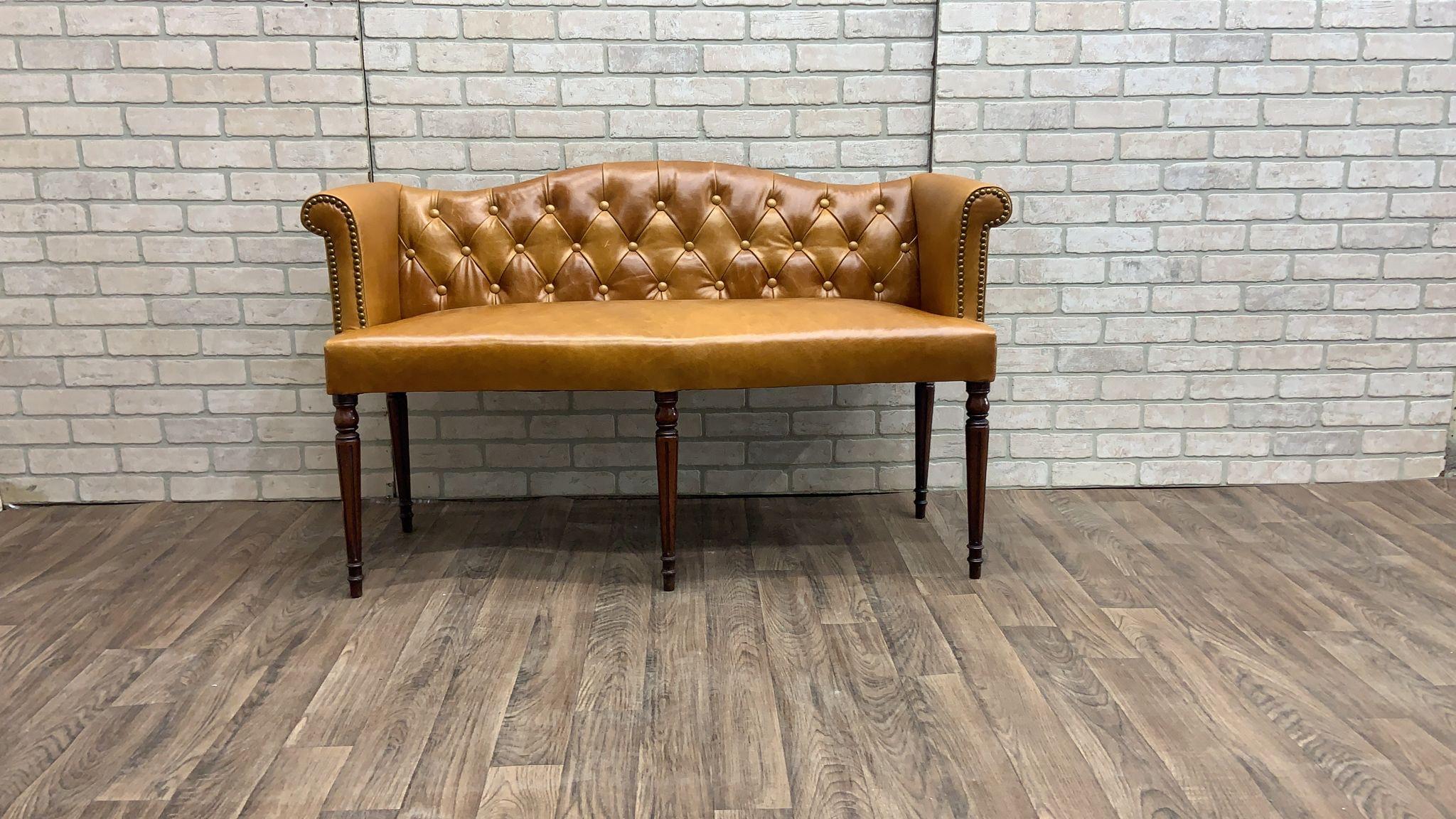 Antique British Colonial Settee Newly Upholstered in Cognac Leather

This handsome antique British Colonial 5-leg settee has been meticulously restored and newly upholstered in sumptuous “Cognac” full-grain Italian leather. Its classic and elegant