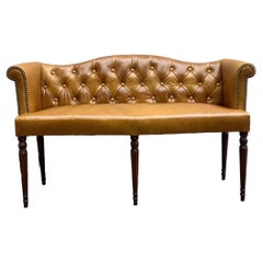 Retro British Colonial Settee Newly Upholstered in Cognac Leather