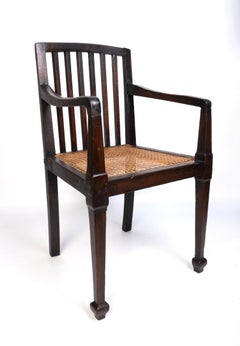 Antique British Colonial Teak and Rattan Hall Elbow Chair, C. 1900