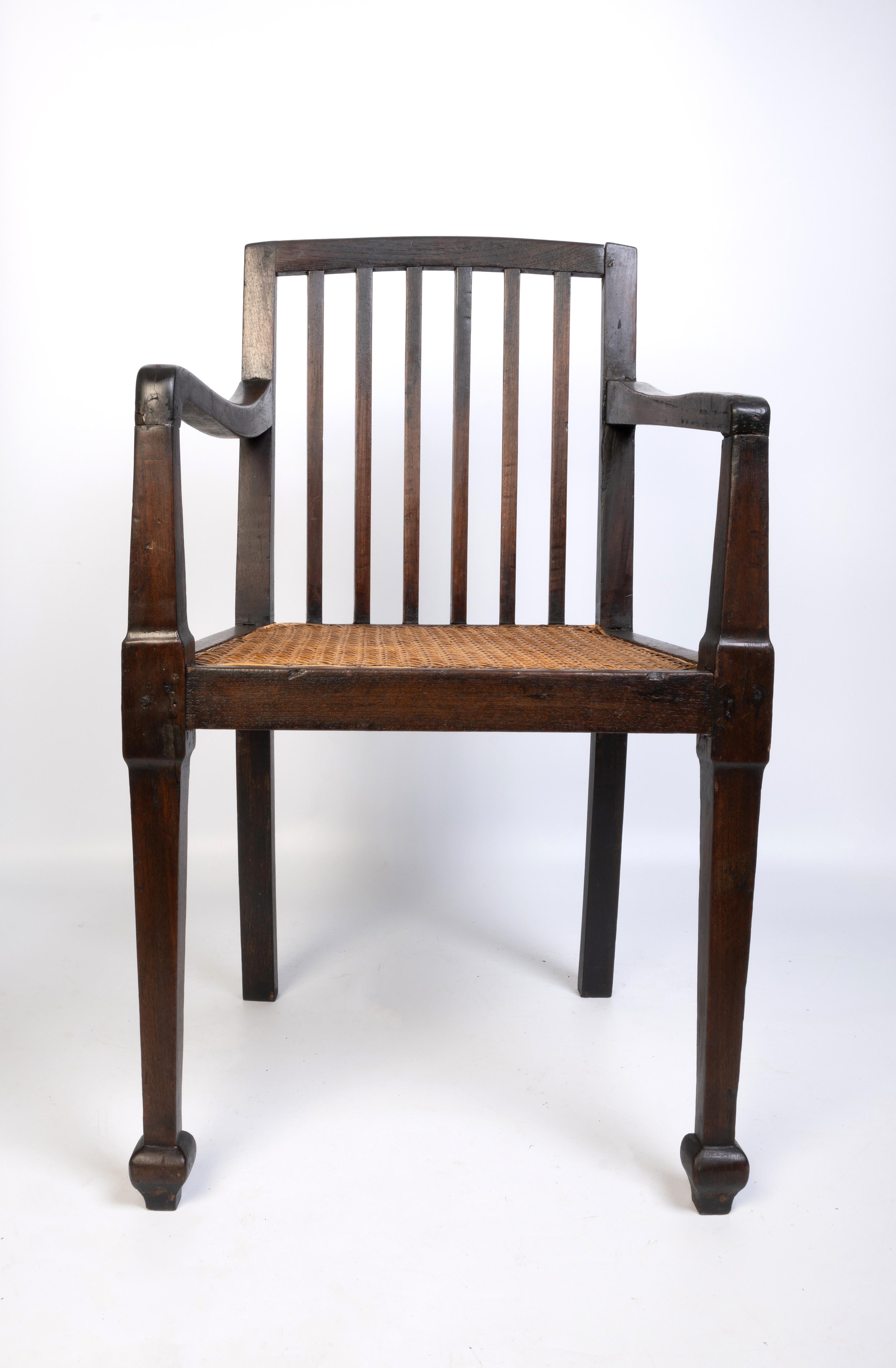 Antique British Colonial Teak and Rattan Hall Elbow Chair, C. 1900 In Fair Condition For Sale In London, GB