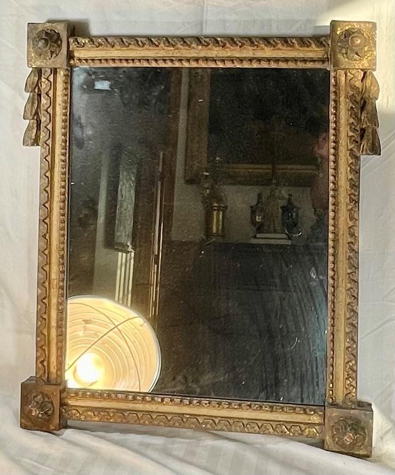 Antique British neoclassical William Kent mirror.

This English polychrome painted parcel gilt frame was created in the early 18th century, circa 1730 and designed in the Palladian style. It is attributed to William Kent.. The frame is finely carved